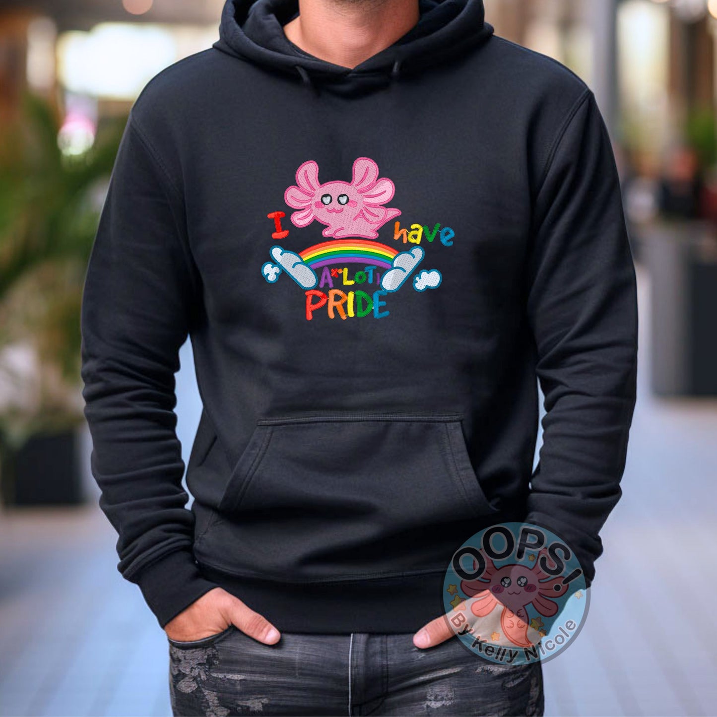 Embroidered "Axolotl PRIDE" Rainbow LGBTQIA+ Unisex Custom Hoodie in Black. Order yours today at https://oopsbykellynicole.com.