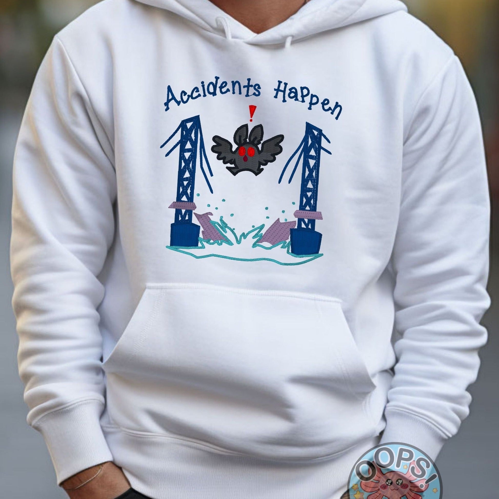 Mothman "Accidents Happen" Funny Embroidered Heavyweight Unisex Hoodie in WHITE  Shop online today to get yours at HTTPS://OOPSBYKELLYNICOLE.COM 