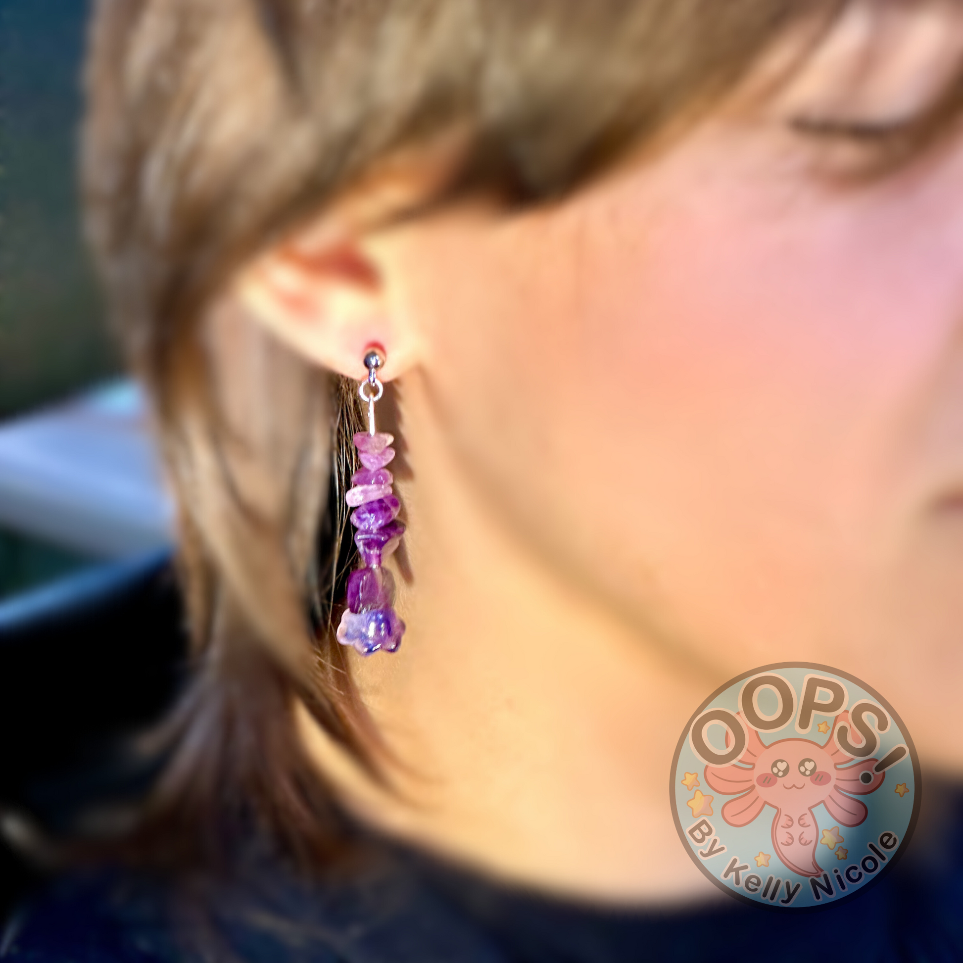 Amethyst drop Floral  earrings with silver plated -plated hypoallergenic posts. Lightweight and  perfect for home, work, party or memorable Gift. On model.Shop online today to get yours at HTTPS://OOPSBYKELLYNICOLE.COM 