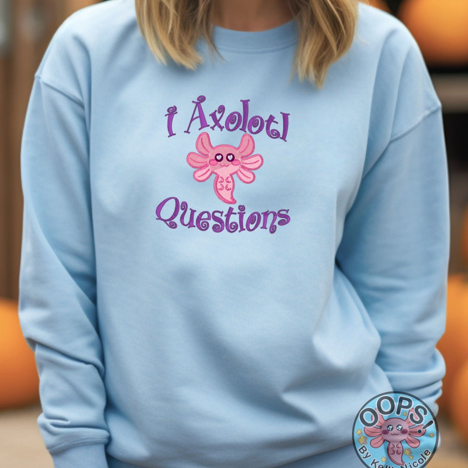 AXOLOTL QUESTIONS PINK AXOLOTL   Embroidered Heavyweight Unisex Sweatshirt in BLUE  Shop online today to get yours at HTTPS://OOPSBYKELLYNICOLE.COM 