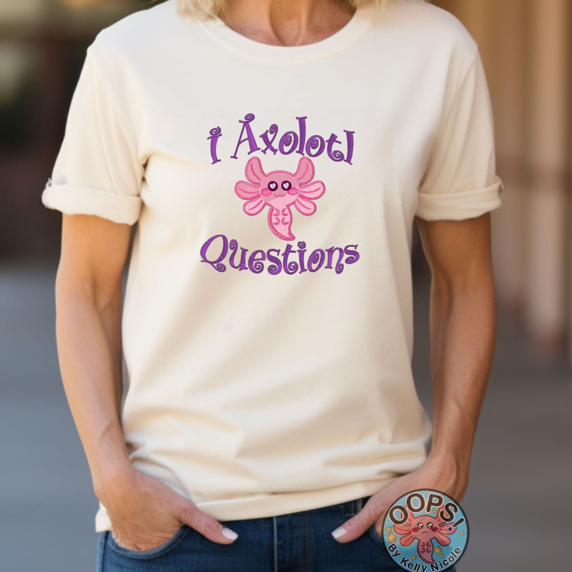 AXOLOTL QUESTIONS PINK AXOLOTL  Embroidered Heavyweight Unisex Comfort Colors T-shirt iN SAND Shop online today to get yours at HTTPS://OOPSBYKELLYNICOLE.COM 