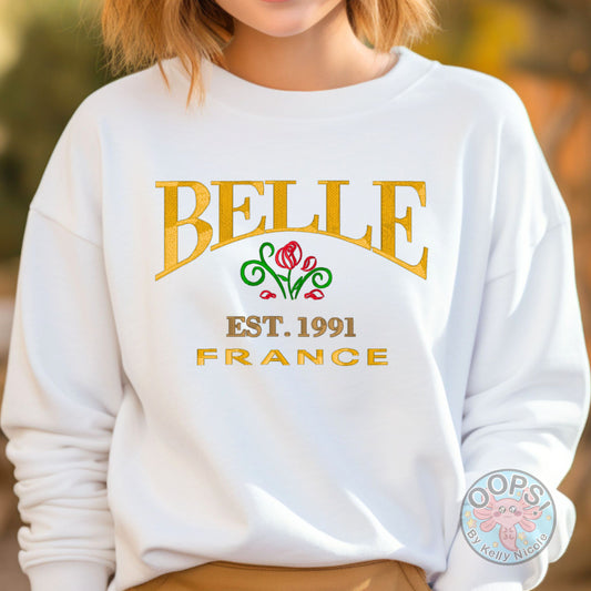 “BELLE” Disney Princess Beauty and the Beast, Embroidered Heavyweight Unisex Sweatshirt in WHITE. Shop online today to get yours at HTTPS://OOPSBYKELLYNICOLE.COM