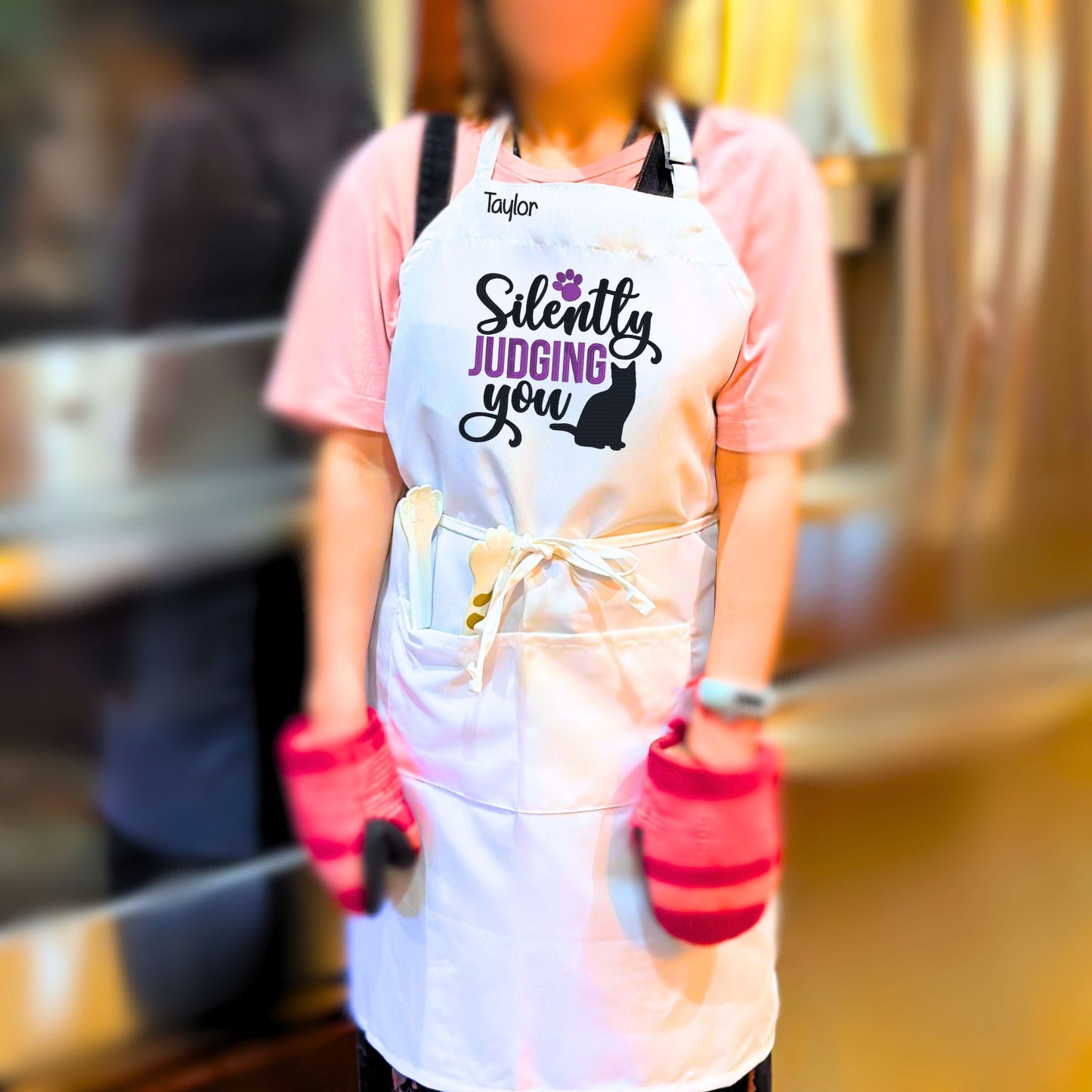 The perfect personalized CAT-lover gift for that person who has everything!&nbsp; Our Unisex Bib-Apron is 100% polyester, stain resistant machine washable fabric.&nbsp; It is fully adjustable with two convenient front pockets for all your essentials.  Order yours today at HTTPS://OOPSBYKELLYNICOLE.COM