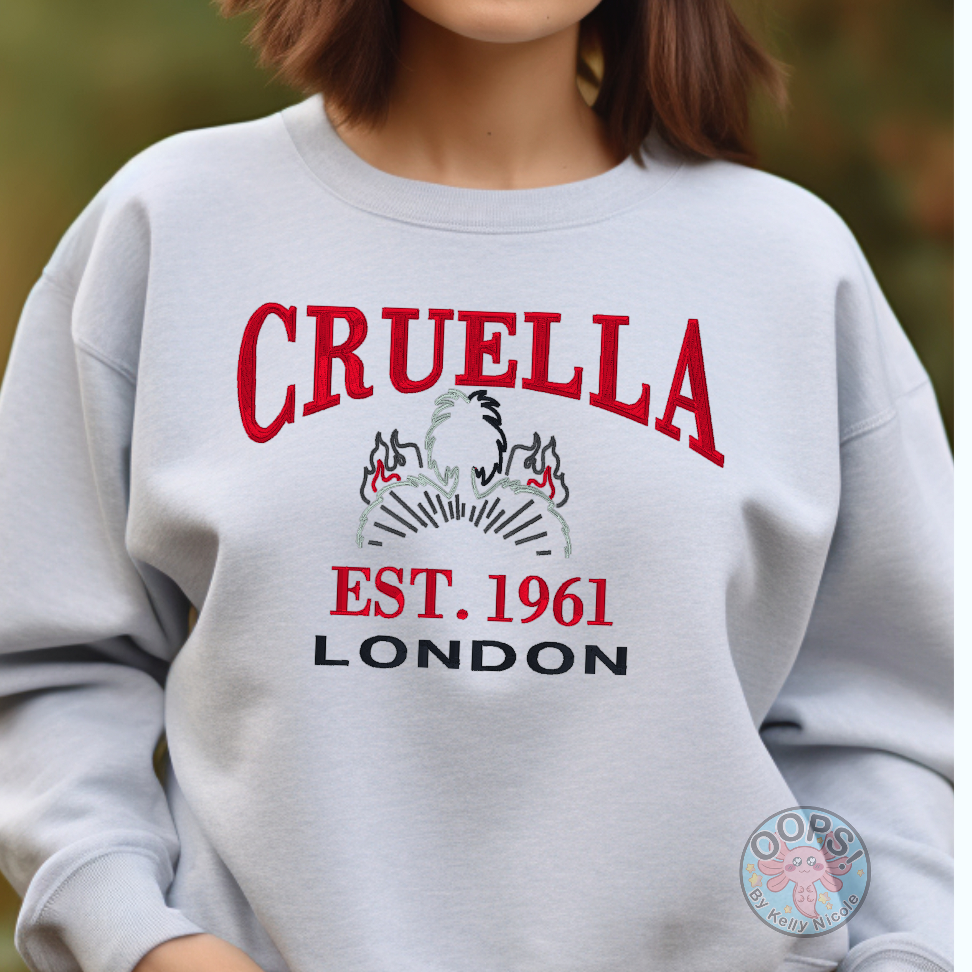 CRUELLA  Disney Villain Embroidered  Heavyweight Unisex Sweatshirt in ASH.  Shop online today to get yours at HTTPS://OOPSBYKELLYNICOLE.COM 