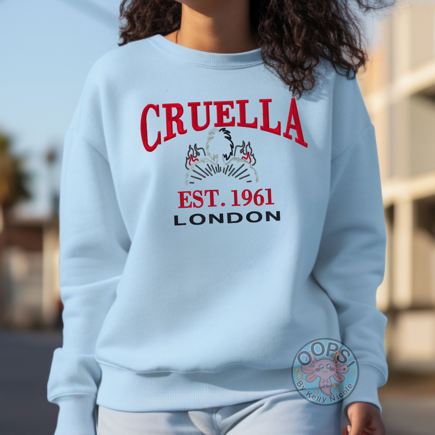 CRUELLA  Disney Villain Embroidered  Heavyweight Unisex Sweatshirt in BLUE.  Shop online today to get yours at HTTPS://OOPSBYKELLYNICOLE.COM 