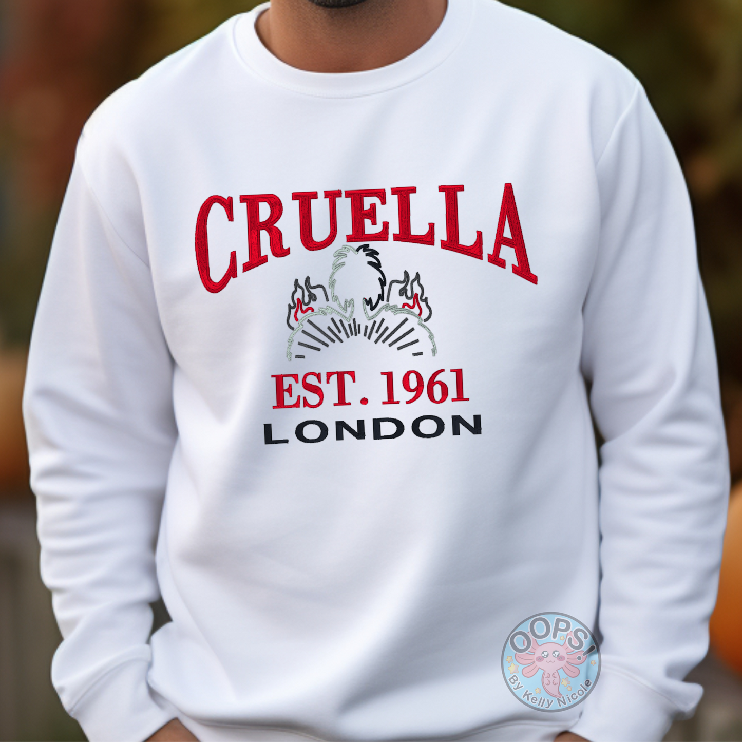 CRUELLA  Disney Villain Embroidered  Heavyweight Unisex Sweatshirt in WHITE.  Shop online today to get yours at HTTPS://OOPSBYKELLYNICOLE.COM 