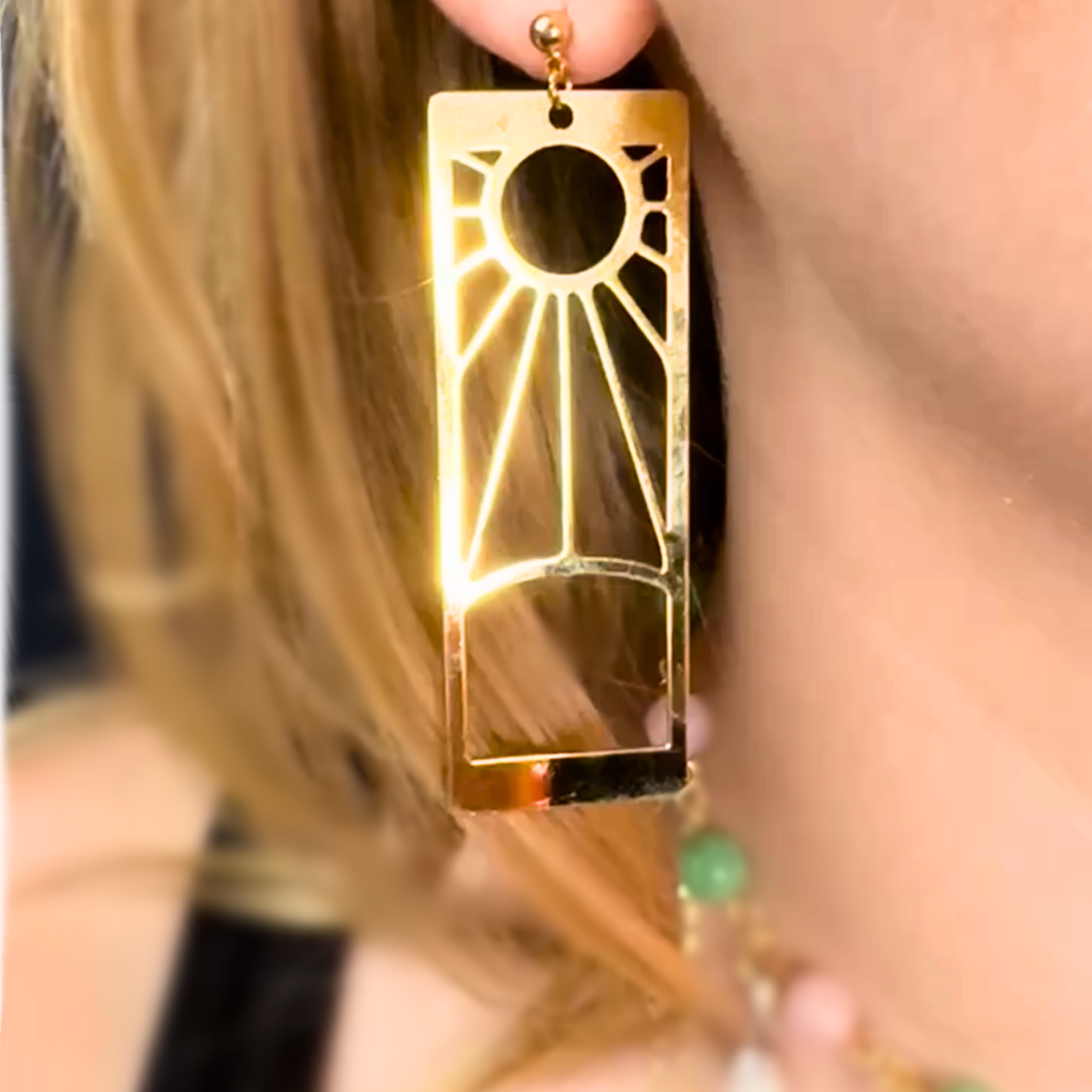 Rising Sun Gold Statement Earrings, Anime Demon Slayer Jewelry, Hanafuda hand-assembled Gold Plated Drop Earrings. On Model. Shop online today to get yours at HTTPS://OOPSBYKELLYNICOLE.COM