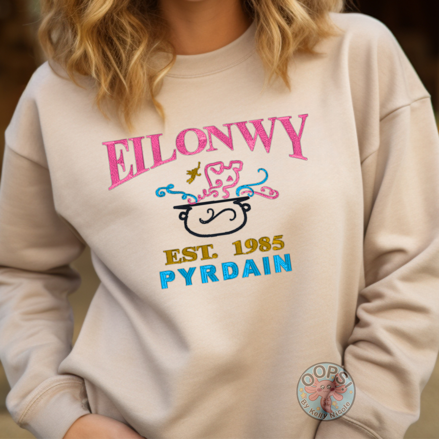 “EILONWY”  Disney Princess  The Black Cauldron,    Embroidered  Heavyweight Unisex Sweatshirt in SAND.  Shop online today to get yours at HTTPS://OOPSBYKELLYNICOLE.COM 