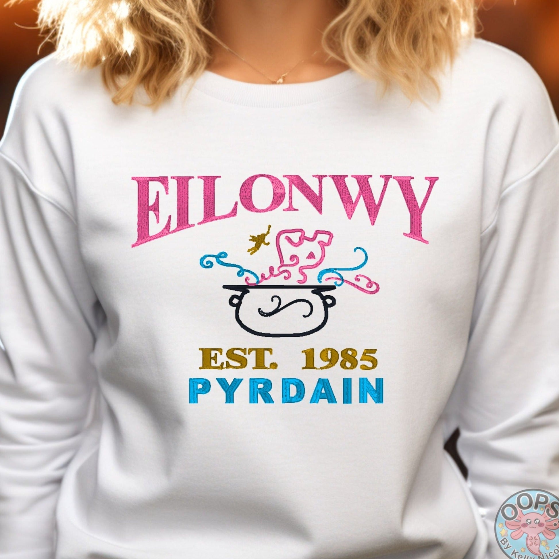 “EILONWY”  Disney Princess  The Black Cauldron,    Embroidered  Heavyweight Unisex Sweatshirt in WHITE.  Shop online today to get yours at HTTPS://OOPSBYKELLYNICOLE.COM 