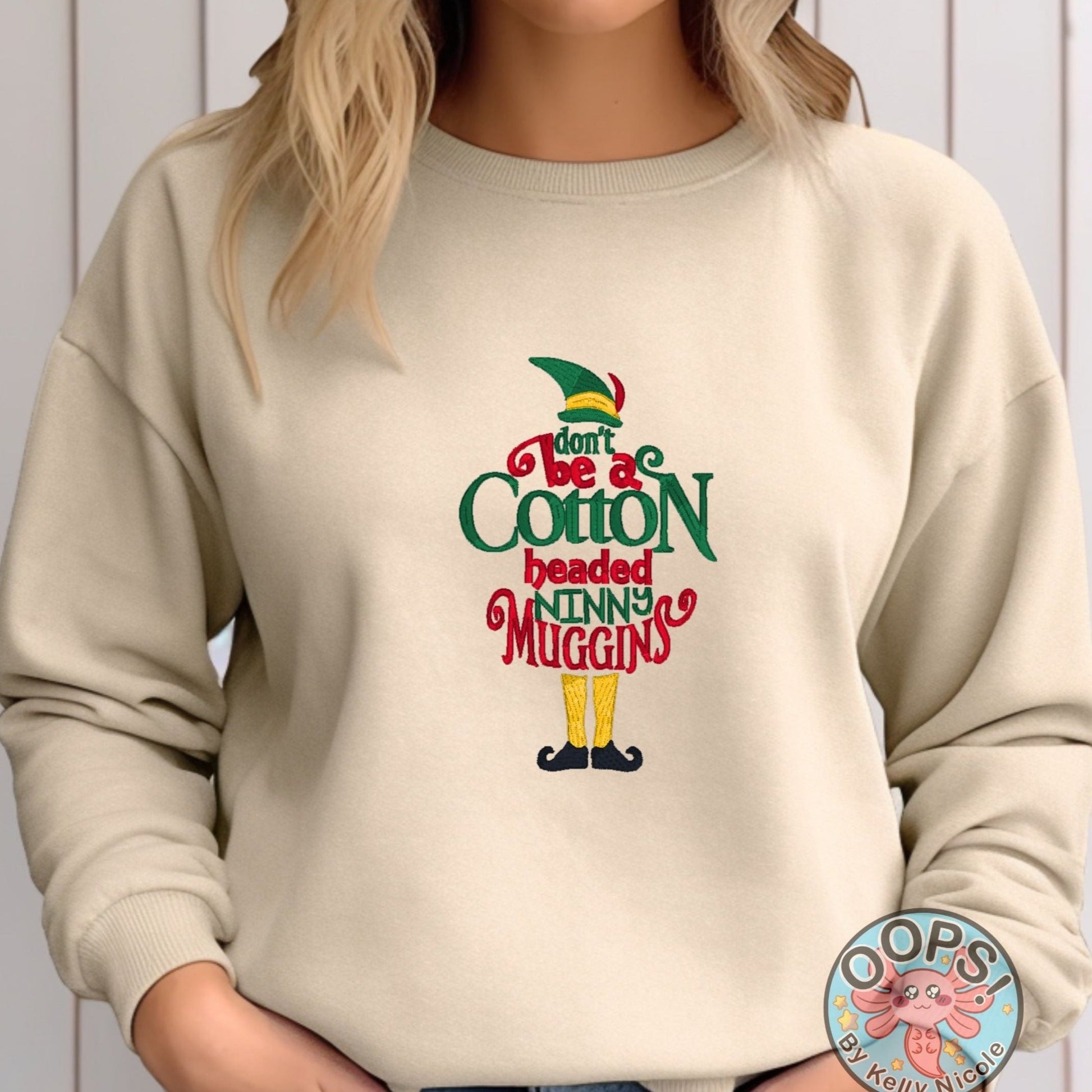 Christmas "ELF - Don't Be a Cotton Headed Ninny Muggins"Embroidered Heavyweight Unisex Sweatshirt in SAND  Shop online today to get yours at HTTPS://OOPSBYKELLYNICOLE.COM 