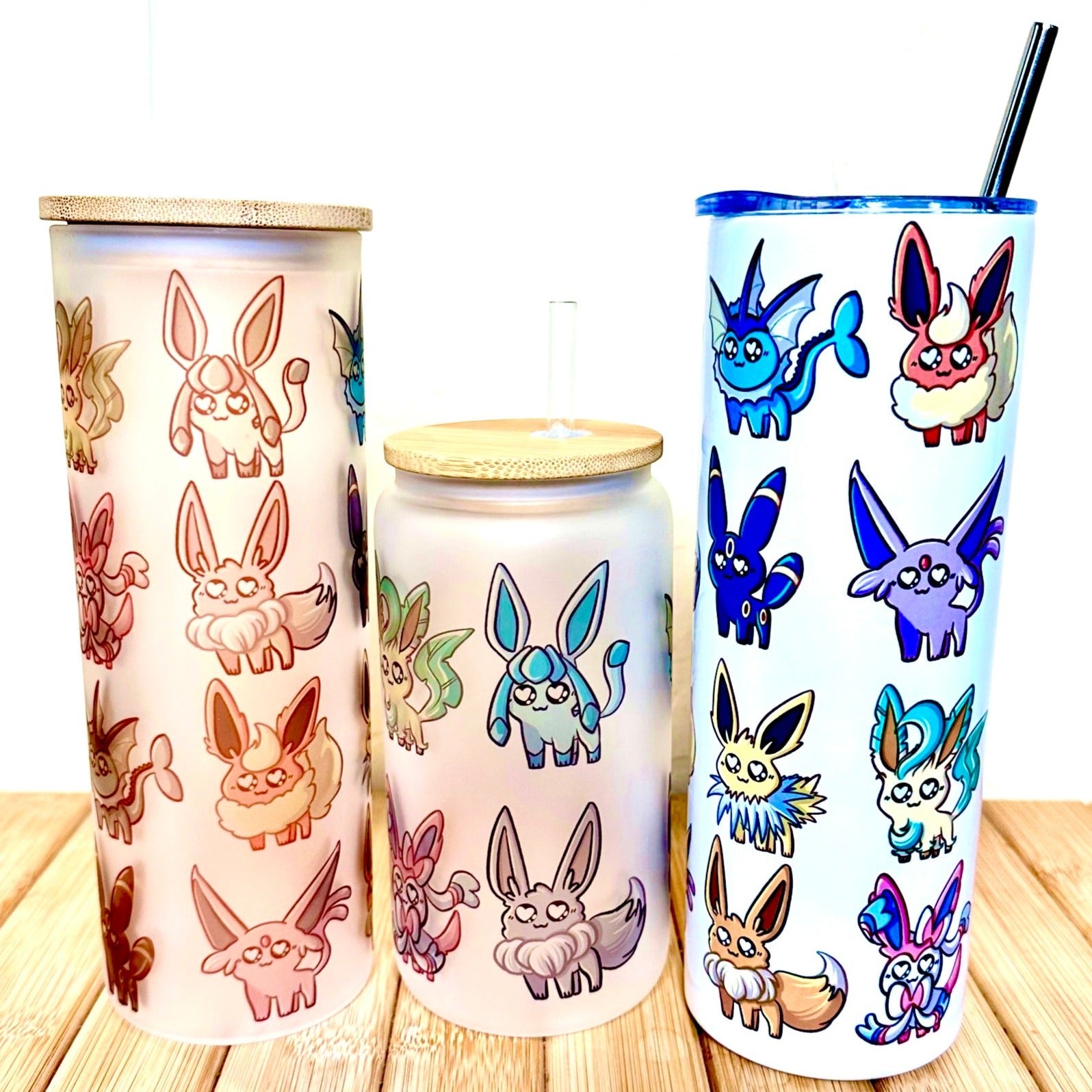 Custom designed Eevee-lution Pokemon, FROSTED GLASS or INSULATED STAINLESS STEEL Sublimation TUMBLERS in 16 oz or 20 oz.  White background with Orange, Green Black design.  Lid and Straw Included. Shop online today to get yours at HTTPS://OOPSBYKELLYNICOLE.COM 002