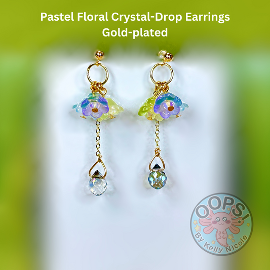 Pastel Floral earrings with large crystal Drop. Gold    plated  hypoallergenic posts. Lightweight and  perfect for home, work, party or memorable Gift. Shop online today to get yours at HTTPS://OOPSBYKELLYNICOLE.COM 