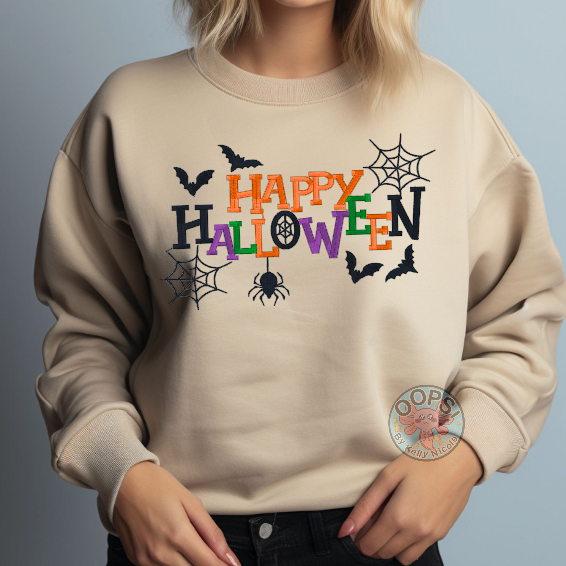 "Happy Halloween"  Embroidered Heavyweight Unisex Sweatshirt in SAND  Shop online today to get yours at HTTPS://OOPSBYKELLYNICOLE.COM 