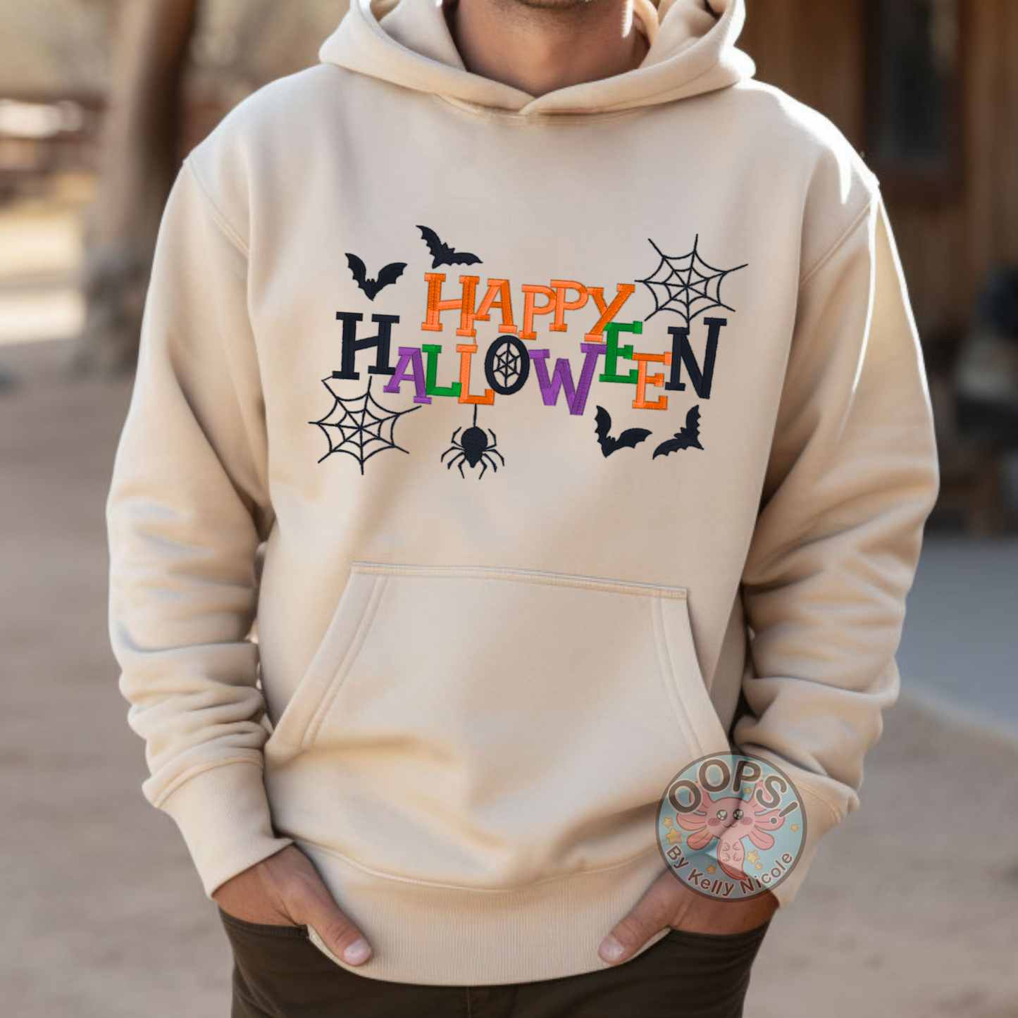 "Happy Halloween"  Embroidered Heavyweight Unisex Hoodie in SAND.  Shop online today to get yours at HTTPS://OOPSBYKELLYNICOLE.COM 