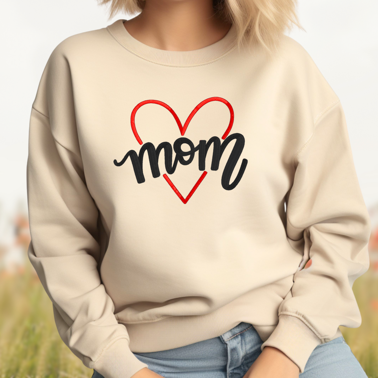 Embroidered "Love Mom"  Sand Sweatshirt perfect for Mother's Day or anyday cozy comfort wear. The perfect personalized gift for any Mom. Order yours today at "oopsbykellynicole.com"!