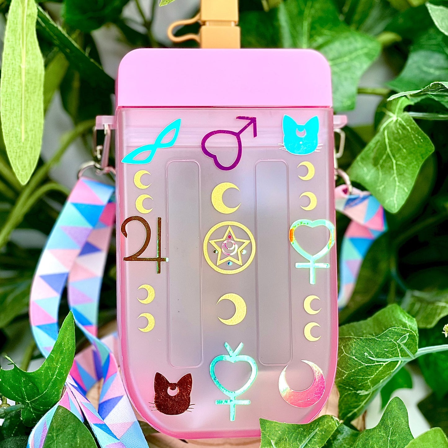 Sailor Moon Wearable Water bottle for 10 oz beverage with lid and straw.  BPA Free, Refillable & customized Perfect for a day out, hands-free use, vacation and Personalized Gift.  Shop online today to get yours at HTTPS://OOPSBYKELLYNICOLE.COM