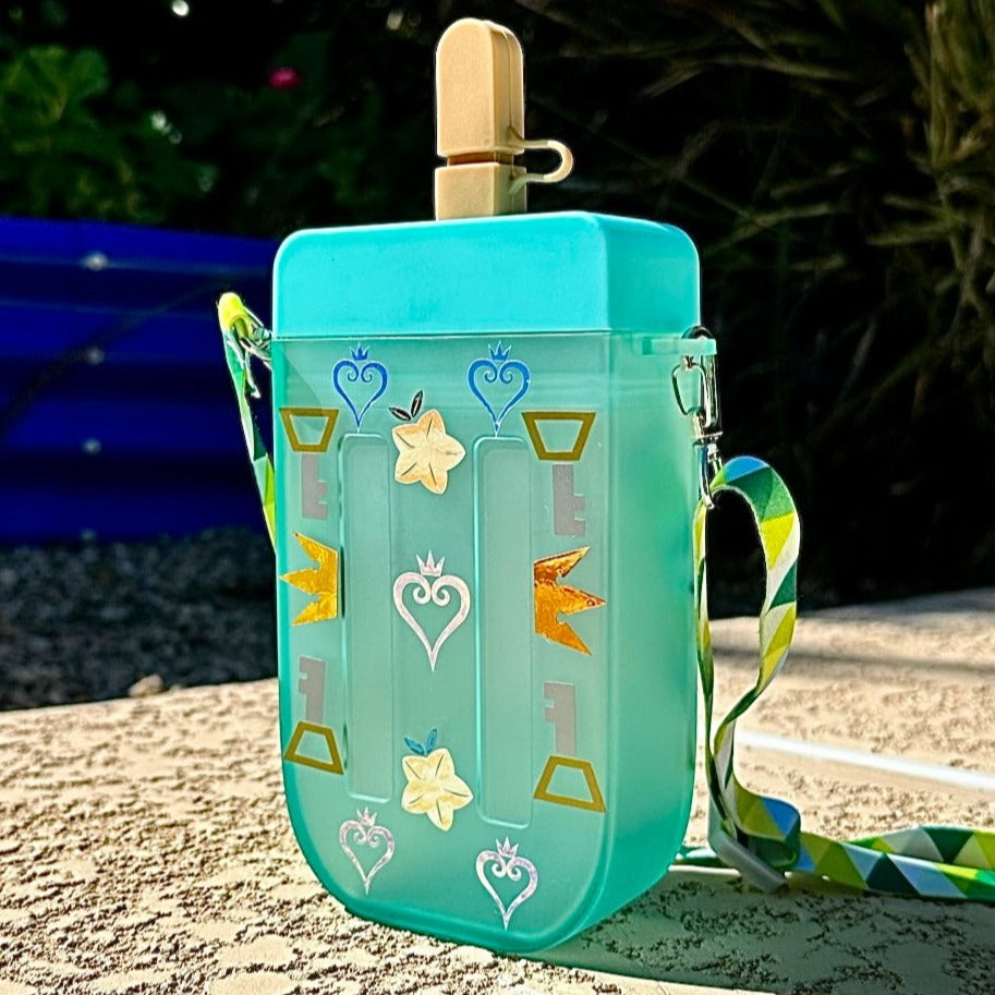 Disney Kingdom Hearts  Wearable Water bottle for 10 oz beverage with lid and straw.  BPA Free, Refillable & customized Perfect for a day out, hands-free use, vacation and Personalized Gift. 02 Shop online today to get yours at HTTPS://OOPSBYKELLYNICOLE.COM