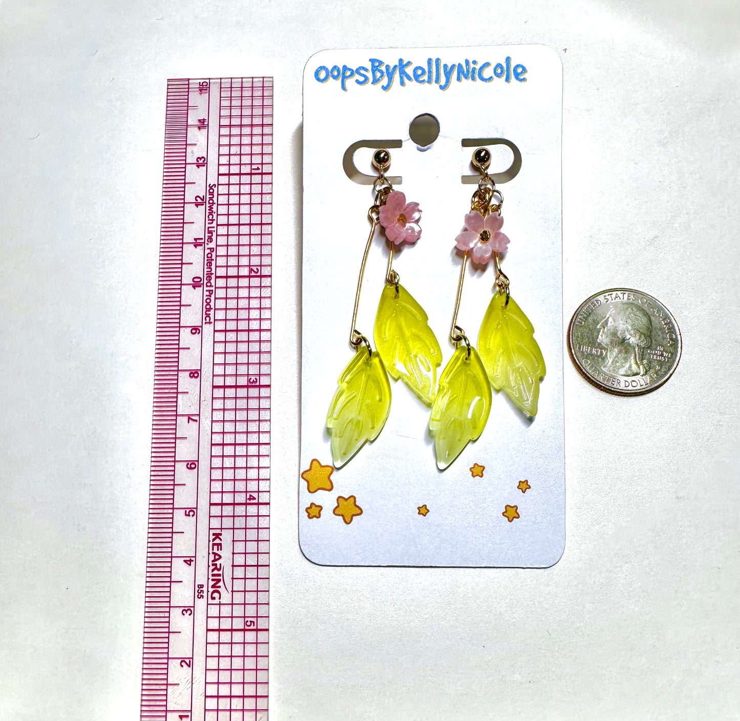 Sakura Pink Cherry Blossom earrings with elegant green leaf Drops with choice of Silver or Gold-plated hypoallergenic posts. Measurement Lightweight and  perfect for home, work, party or memorable Gift. Shop online today to get yours at HTTPS://OOPSBYKELLYNICOLE.COM