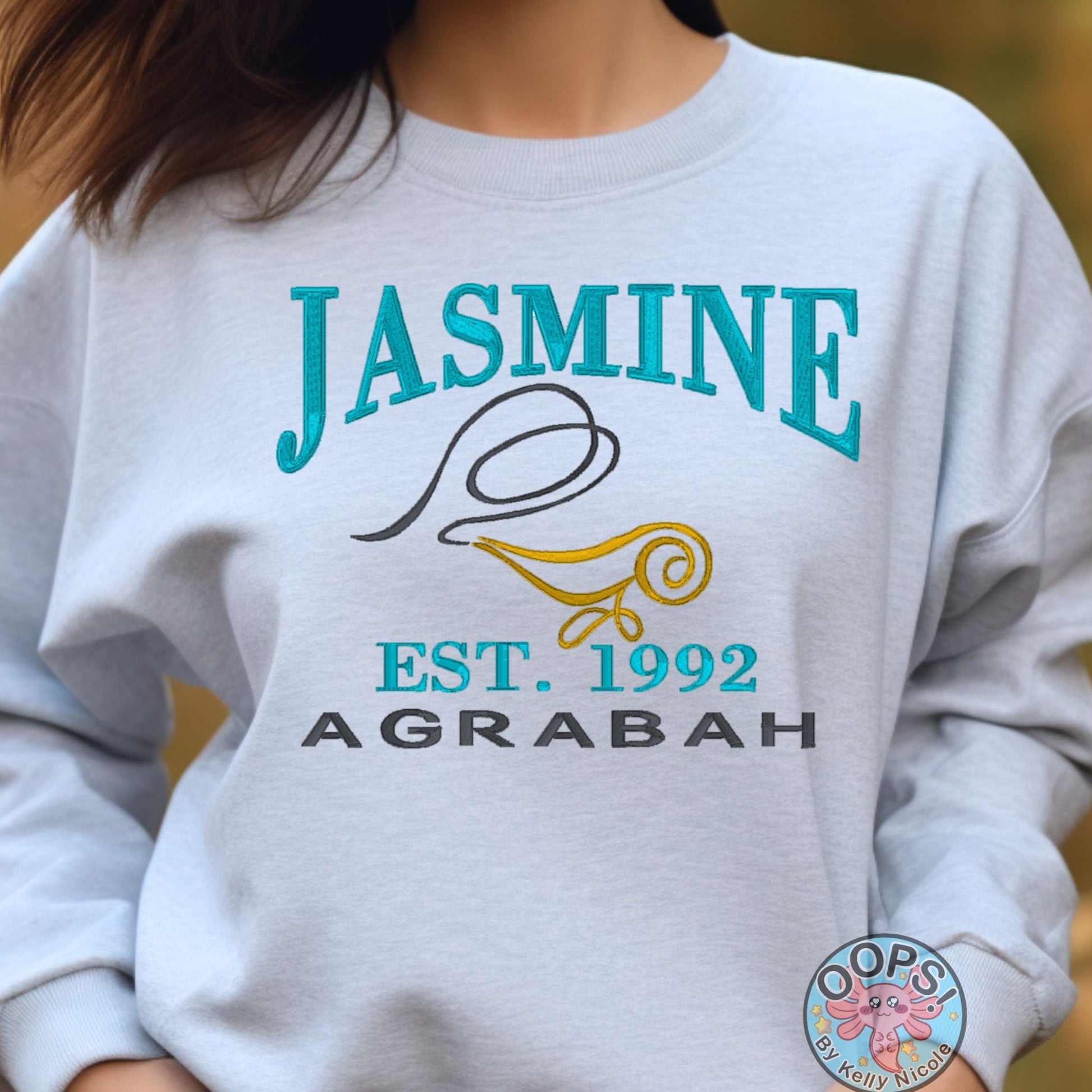 “J̌asmine”  Disney Princess  Embroidered  Heavyweight Unisex Sweatshirt in ASH.  Shop online today to get yours at HTTPS://OOPSBYKELLYNICOLE.COM 