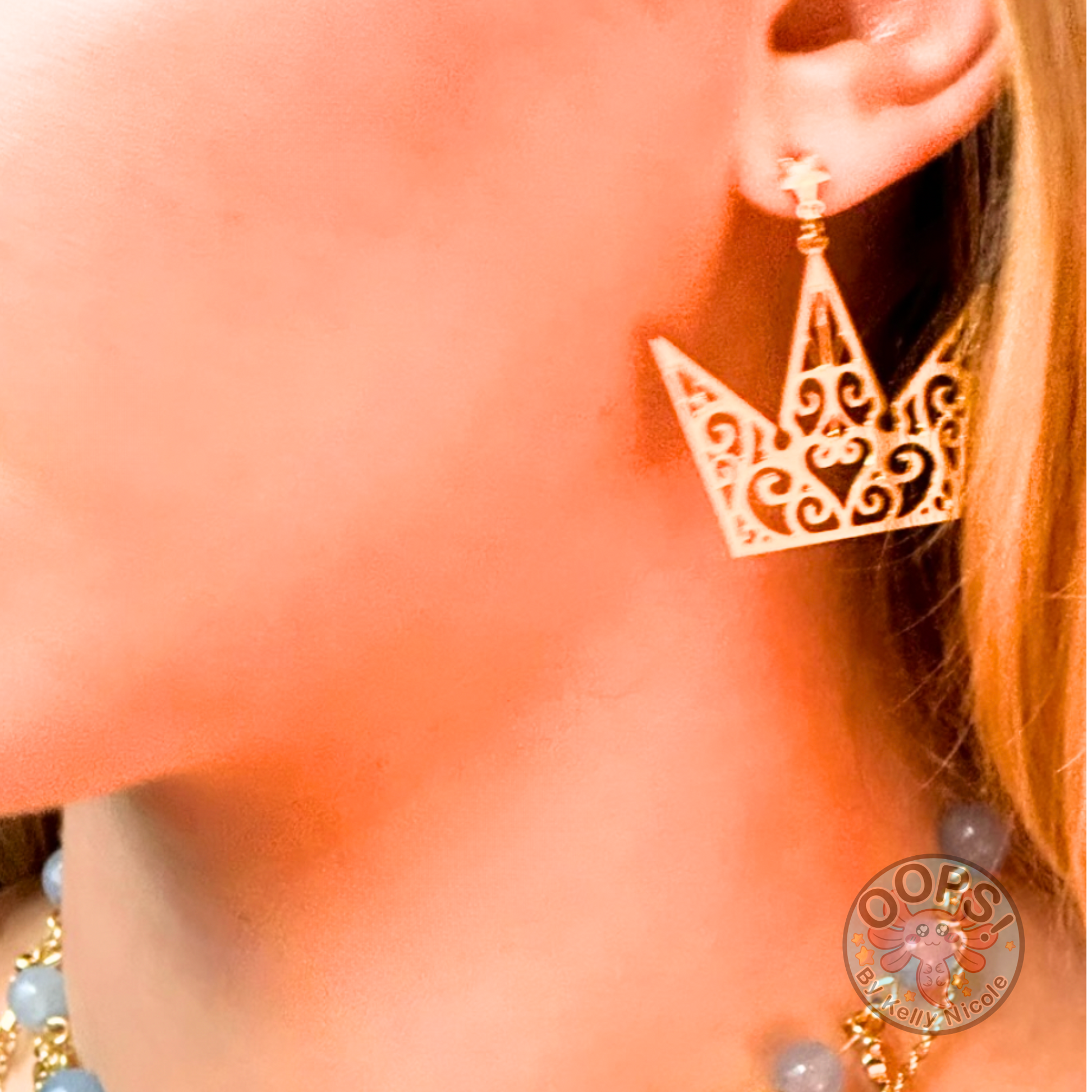 Beautiful Kingdom Hearts Crown Drop Earrings Choice of Gold or Silver-plated, Custom-design.  On Model. Shop online today to get yours at HTTPS://OOPSBYKELLYNICOLE.COM