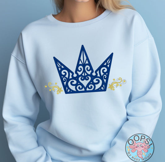 Disney Kingdom Hearts Video Game Crown Shirt.  Embroidered Heavyweight Unisex Sweatshirt in Light Blue.  Shop online today to get yours at HTTPS://OOPSBYKELLYNICOLE.COM 