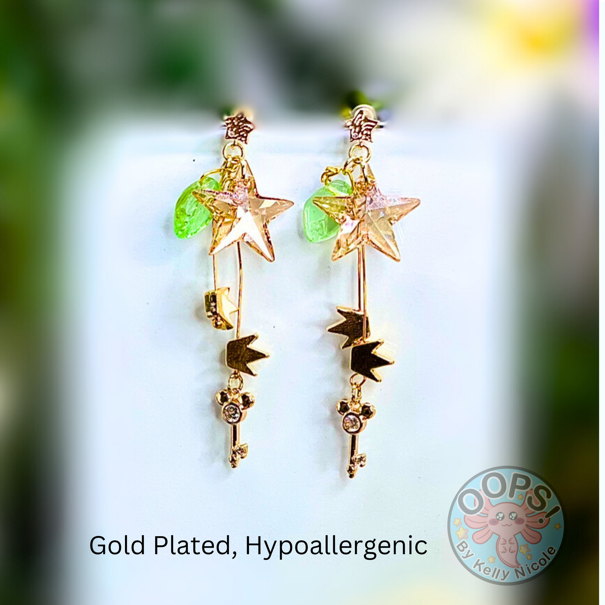 Disney Kingdom Hearts Gold Drop Earrings. Gold plated and Hypoallergenic, lightweight posts. Detail photo. Shop online today to get yours at HTTPS://OOPSBYKELLYNICOLE.COM