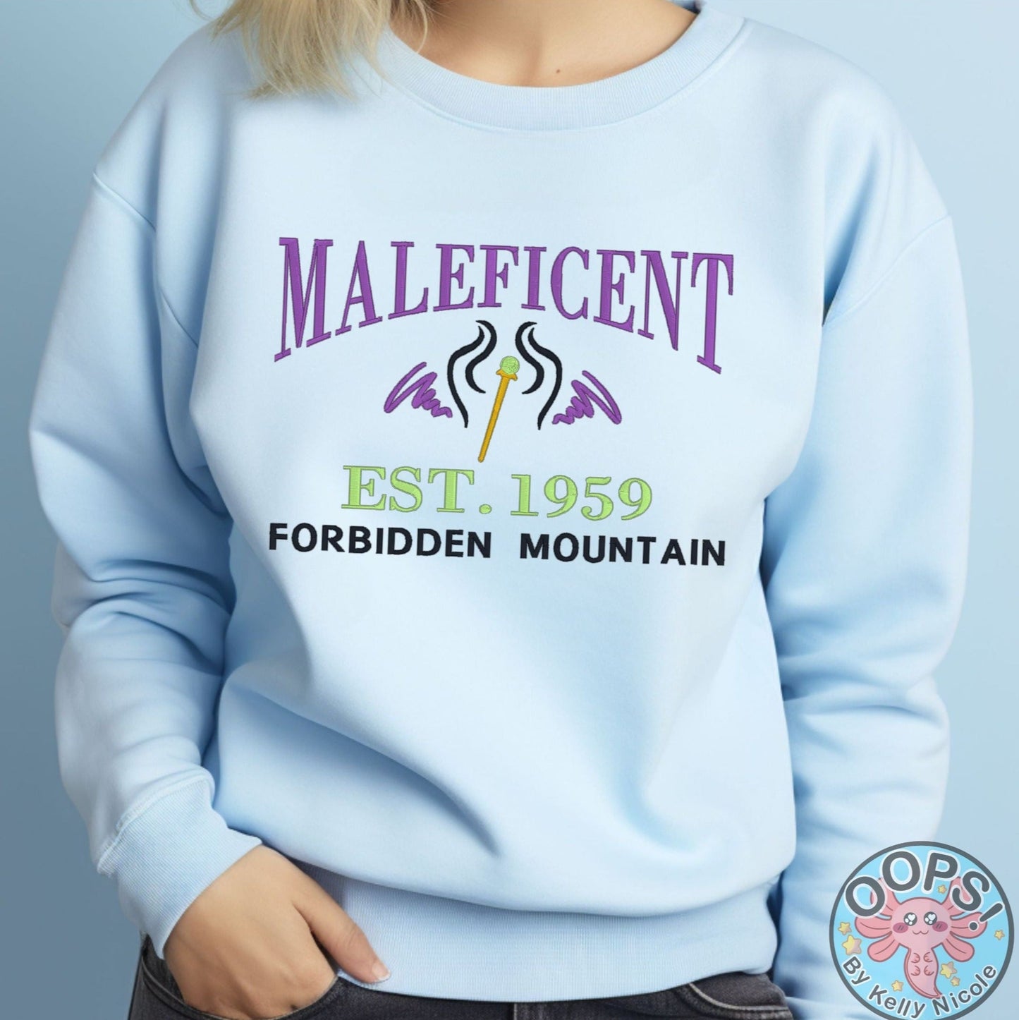 MALEFICENT Disney Villain Embroidered  Heavyweight Unisex Sweatshirt in BLUE.  Shop online today to get yours at HTTPS://OOPSBYKELLYNICOLE.COM