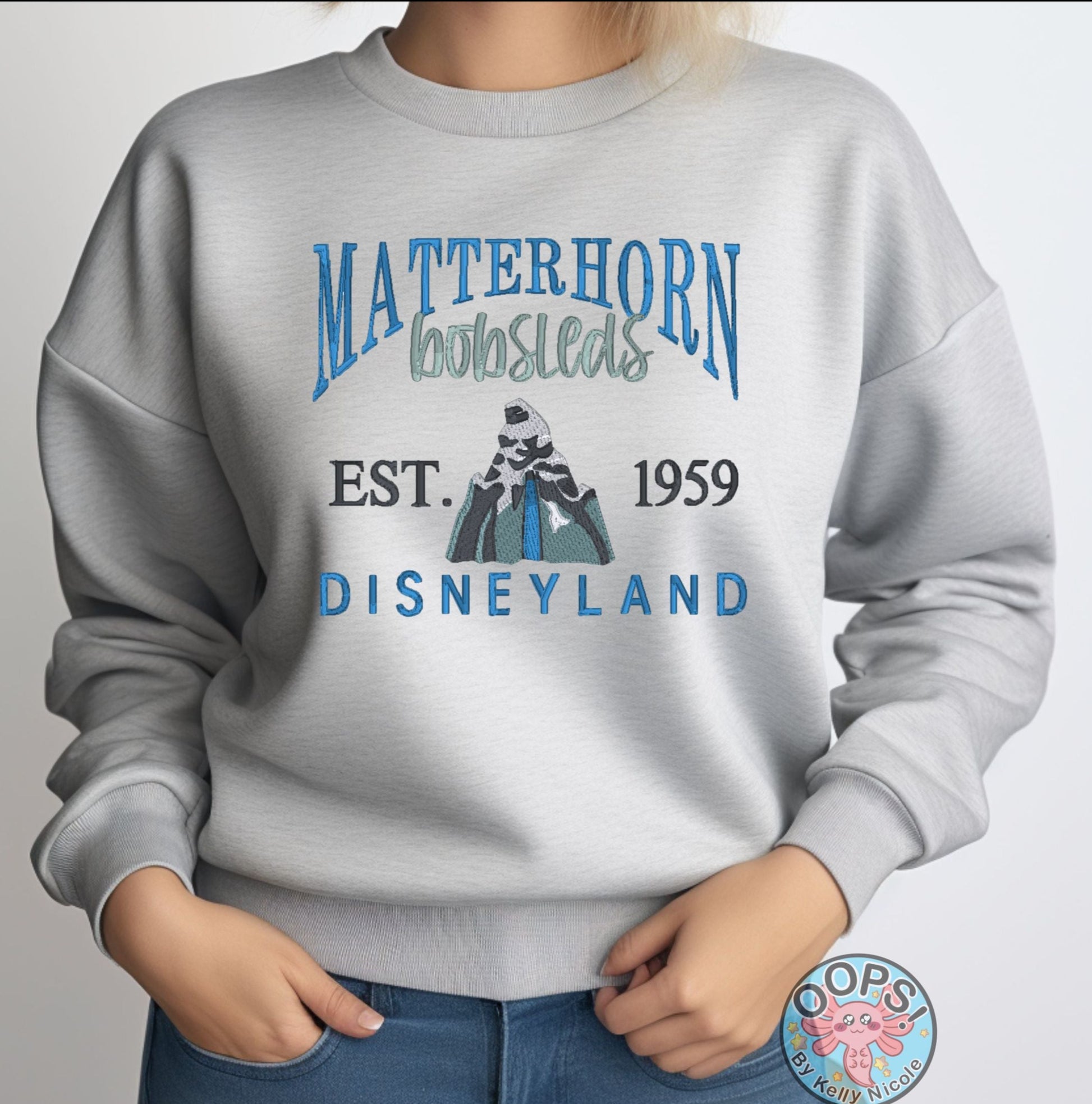 DISNEY “MATTERHORN” Theme Park Embroidered Heavyweight Unisex Sweatshirt in ASH.  Shop online today to get yours at HTTPS://OOPSBYKELLYNICOLE.COM 