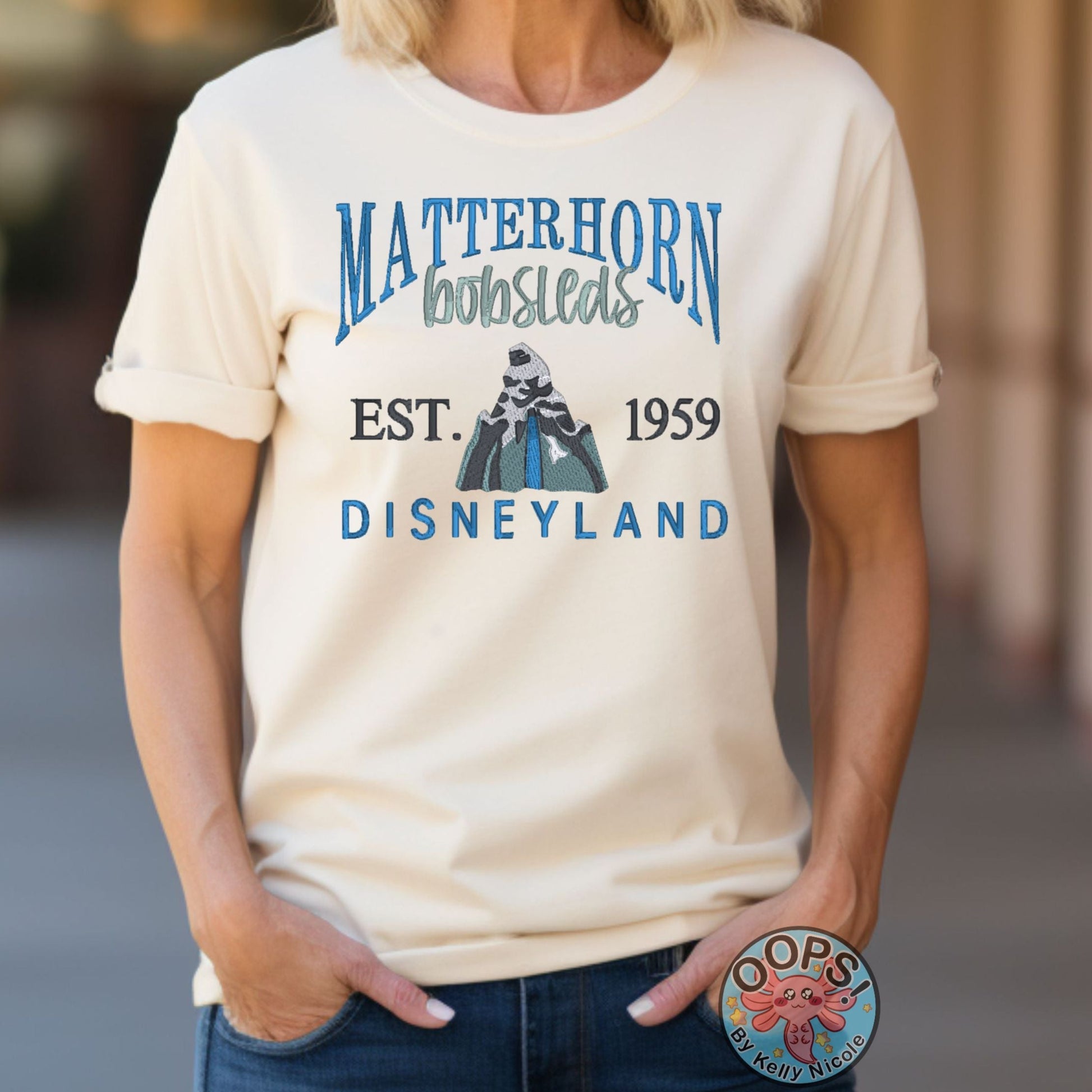 DISNEY “MATTERHORN” Theme Park Embroidered Heavyweight Unisex T-shirt in Sand. Shop online today to get yours at HTTPS://OOPSBYKELLYNICOLE.COM