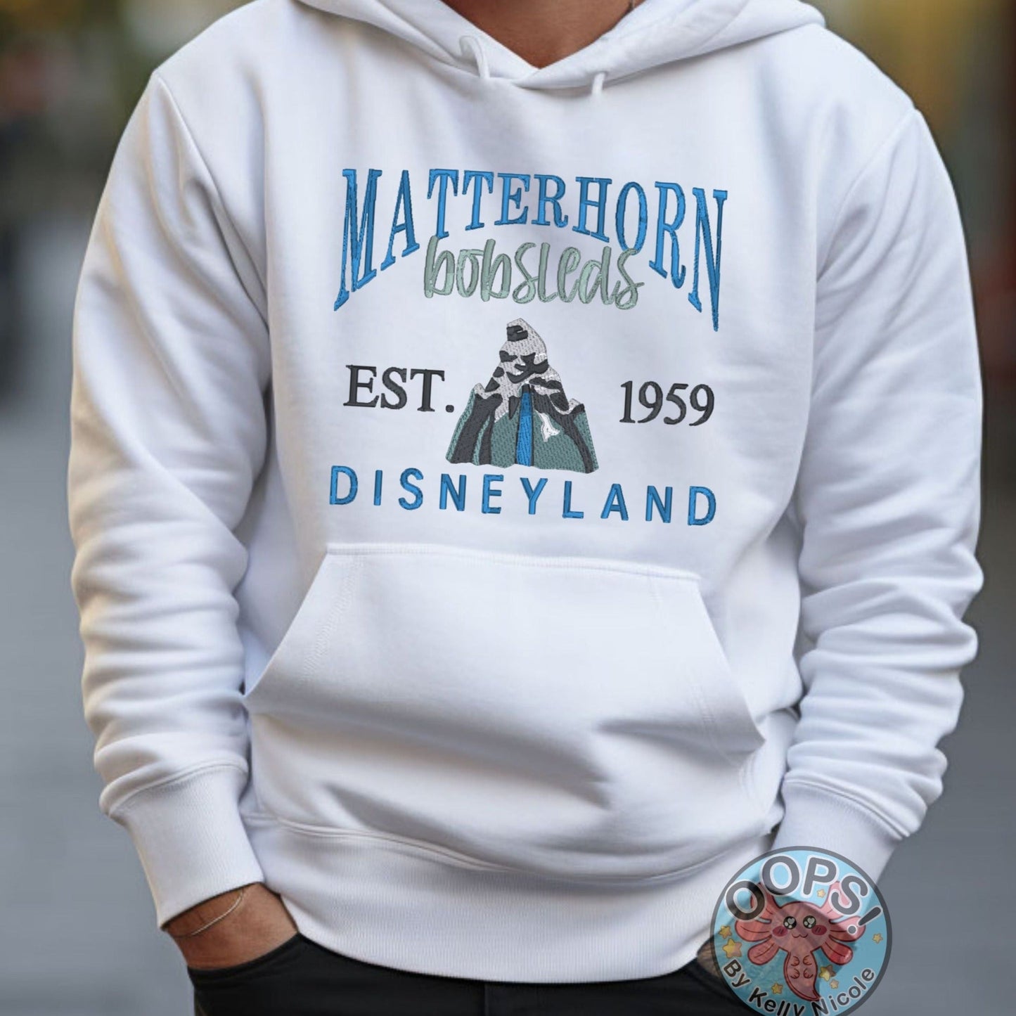 DISNEY “MATTERHORN” Theme Park Embroidered Heavyweight Unisex Hoodie in WHITE.  Shop online today to get yours at HTTPS://OOPSBYKELLYNICOLE.COM 