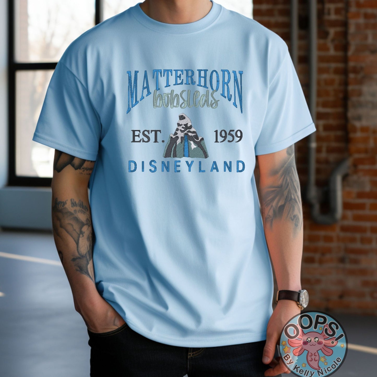 DISNEY “MATTERHORN” Theme Park Embroidered Heavyweight Unisex T-shirt in Blue. Shop online today to get yours at HTTPS://OOPSBYKELLYNICOLE.COM