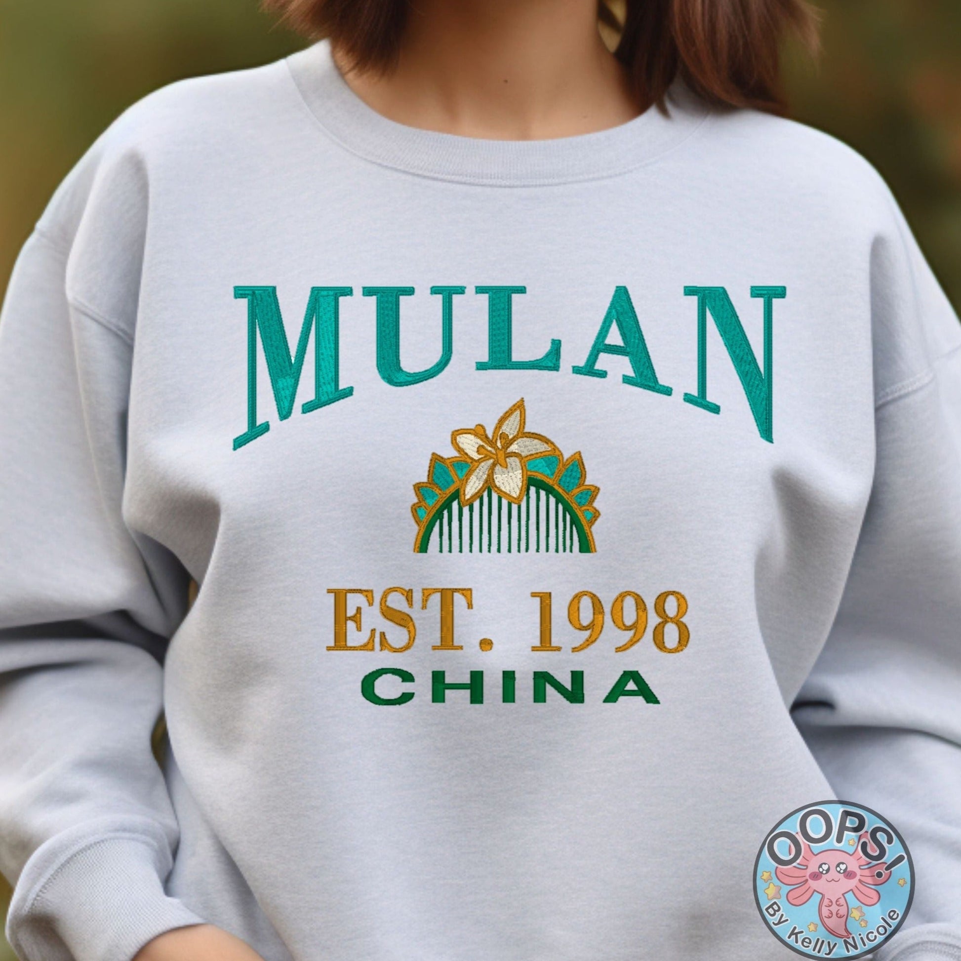 MULAN Disney Princess Embroidered  Heavyweight Unisex Sweatshirt in ASH.  Shop online today to get yours at HTTPS://OOPSBYKELLYNICOLE.COM 