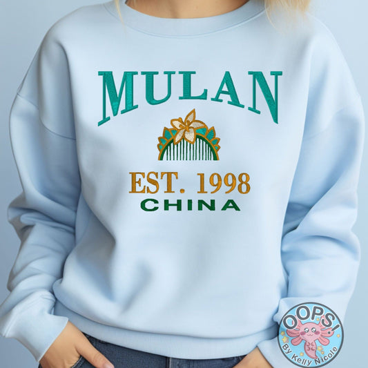 MULAN  Disney Princess Embroidered  Heavyweight Unisex Sweatshirt in BLUE.  Shop online today to get yours at HTTPS://OOPSBYKELLYNICOLE.COM 