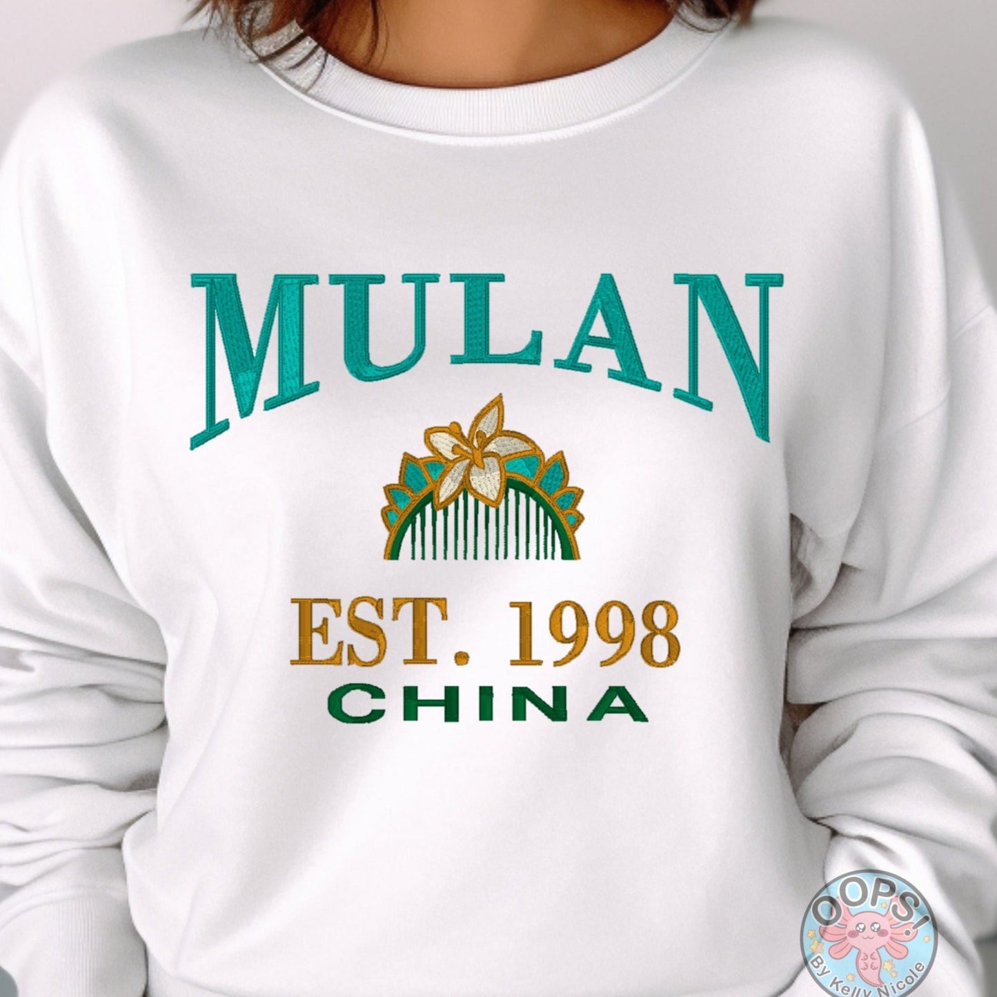 MULAN  Disney Princess Embroidered  Heavyweight Unisex Sweatshirt in WHITE.  Shop online today to get yours at HTTPS://OOPSBYKELLYNICOLE.COM 