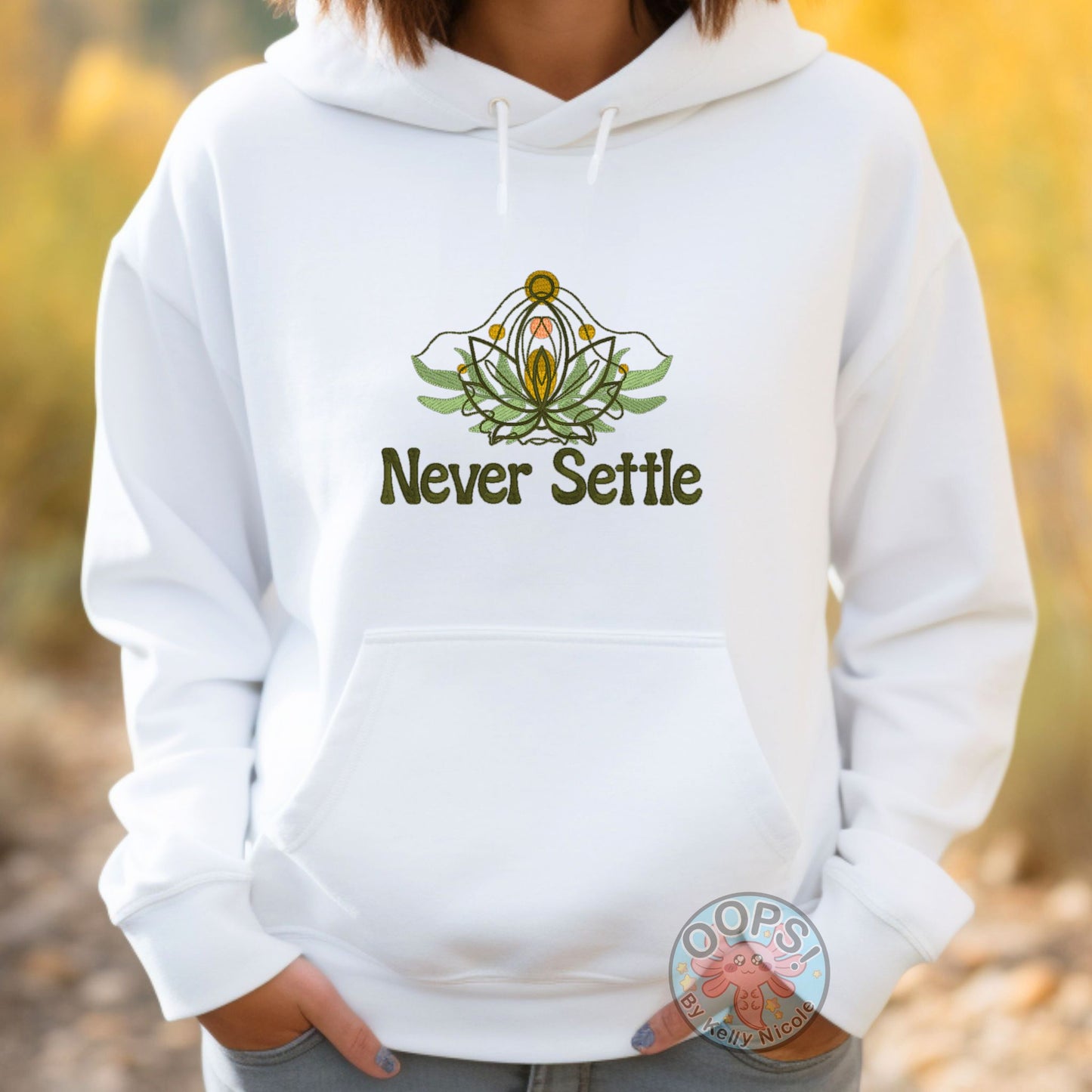 Embroidered “Never Settle” White Unisex Hoodie perfect for Home, work or anytime cozy comfort wear.  Order yours today at https://oopsbykellynicole.com.