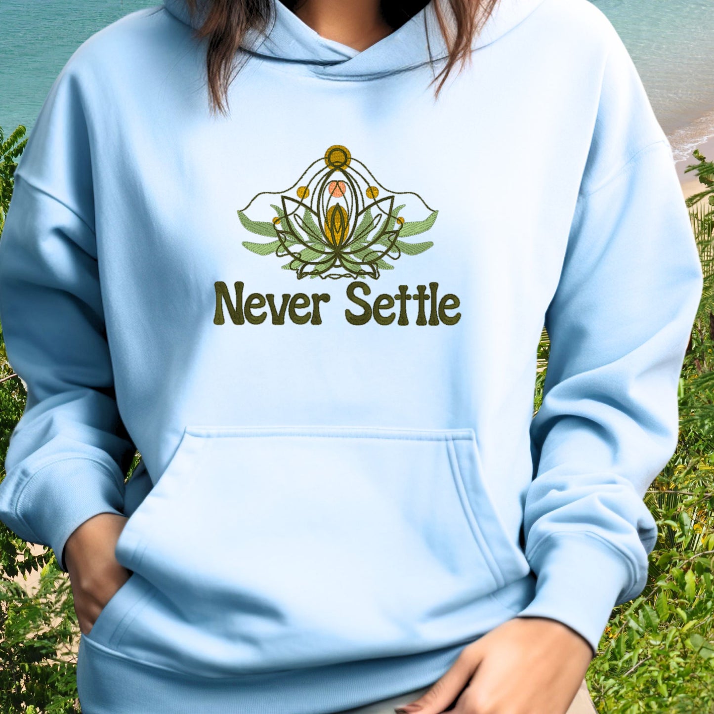 Embroidered “Never Settle” Blue Unisex Hoodie perfect for Home, work or anytime cozy comfort wear.  Order yours today at https://oopsbykellynicole.com.