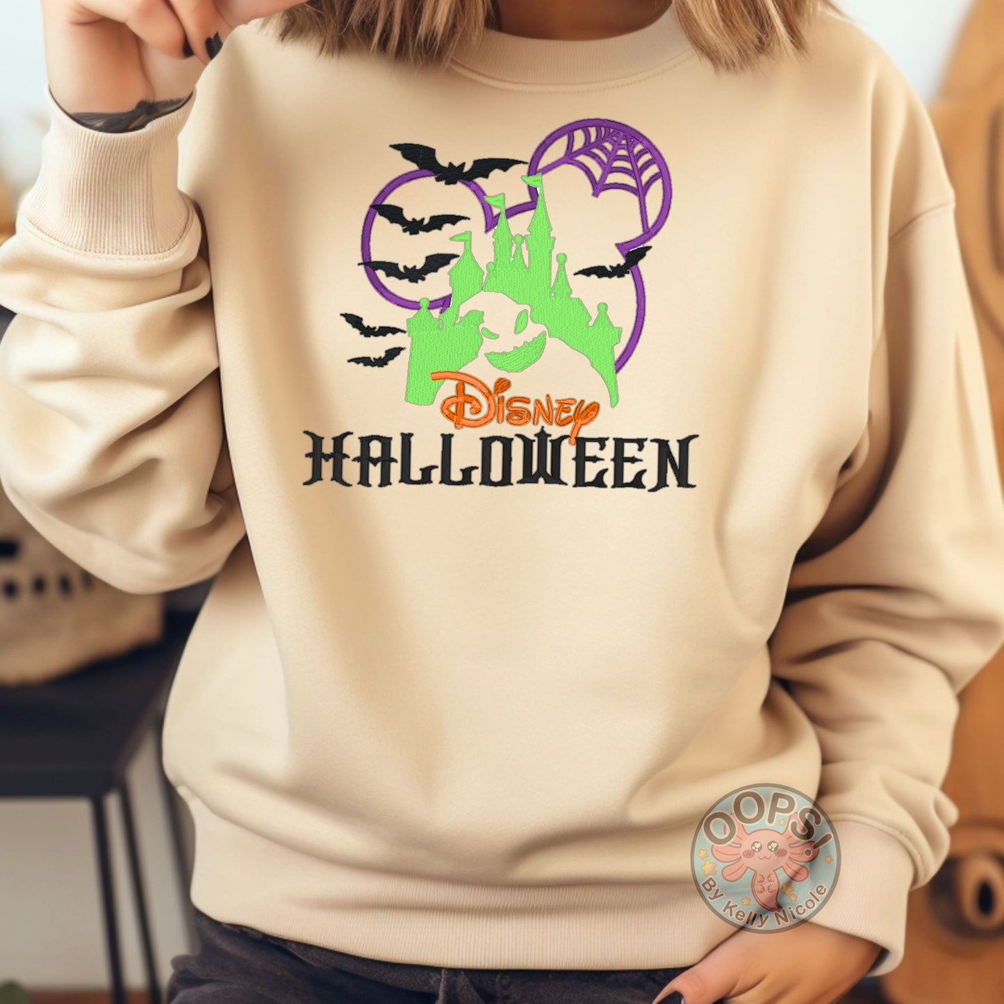 Embroidered DISNEY "Oogie Boogie" Nightmare Before Christmas Halloween Unisex Sweatshirt in Sand. Great for vacation or anytime Cozy comfort wear. Order yours today at HTTPS://OOPSBYKELLYNICOLE.COM