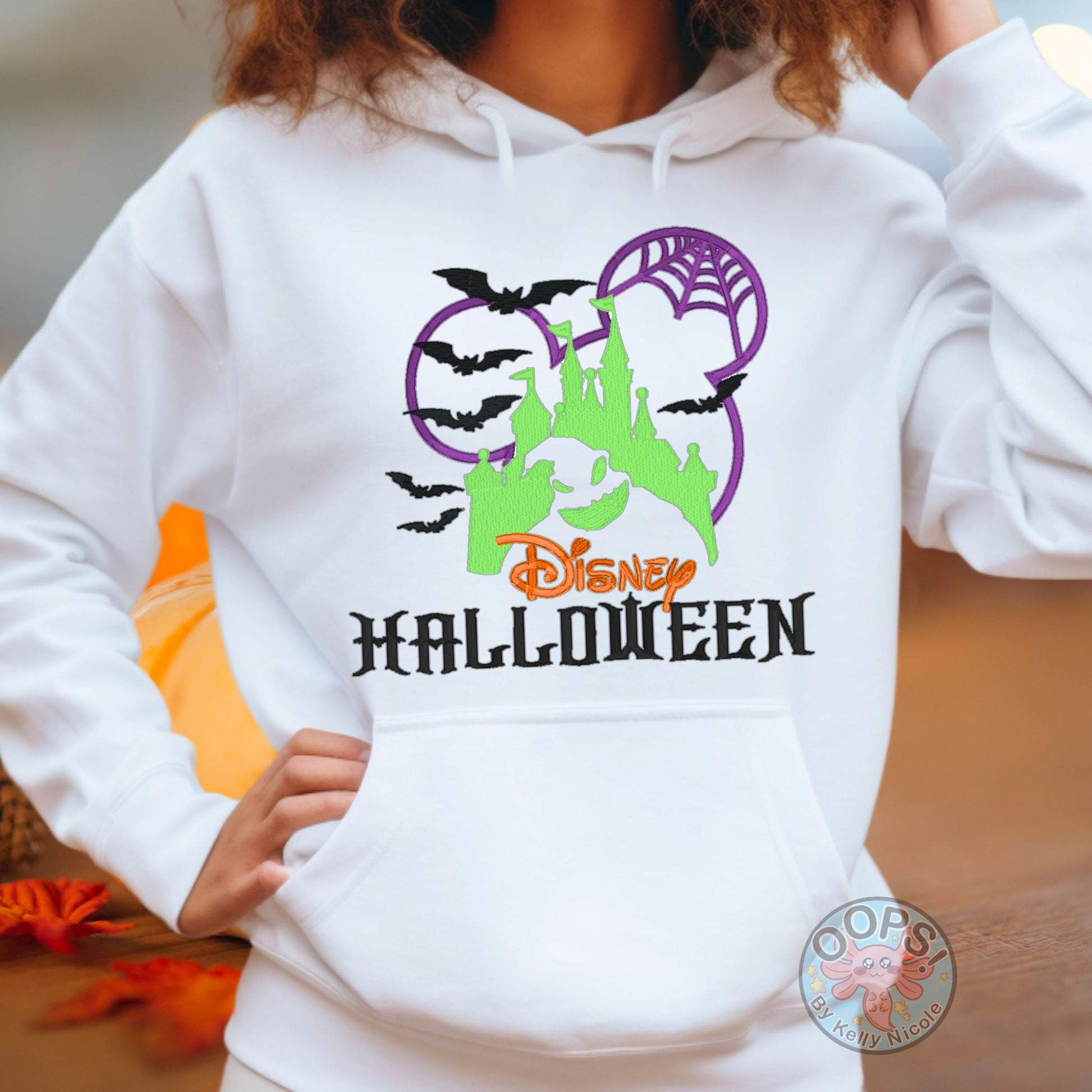 Embroidered DISNEY "Oogie Boogie" Nightmare Before Christmas Halloween Unisex  Hoodie in White. Great for vacation or anytime Cozy comfort wear. Order yours today at HTTPS://OOPSBYKELLYNICOLE.COM