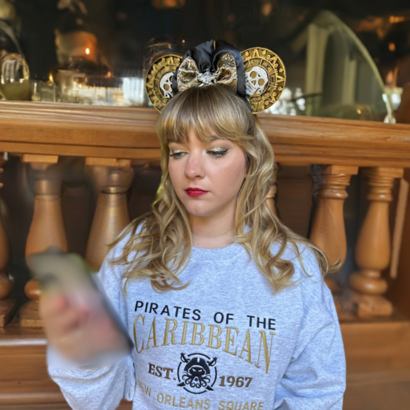 Disney "Pirates of the Caribbean " custom made hand painted and assembled Mickey Ears. Shown worn with matching Shirt . Shop online today to get yours at HTTPS://OOPSBYKELLYNICOLE.COM