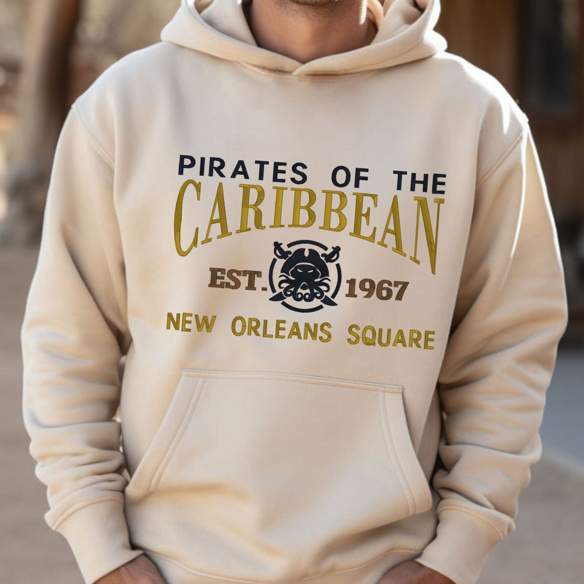 Disney “Pirates of the Caribbean” Embroidered Fandom Shirt. Embroidered Heavyweight Unisex Hoodie in Sand.  Shop online today to get yours at HTTPS://OOPSBYKELLYNICOLE.COM 