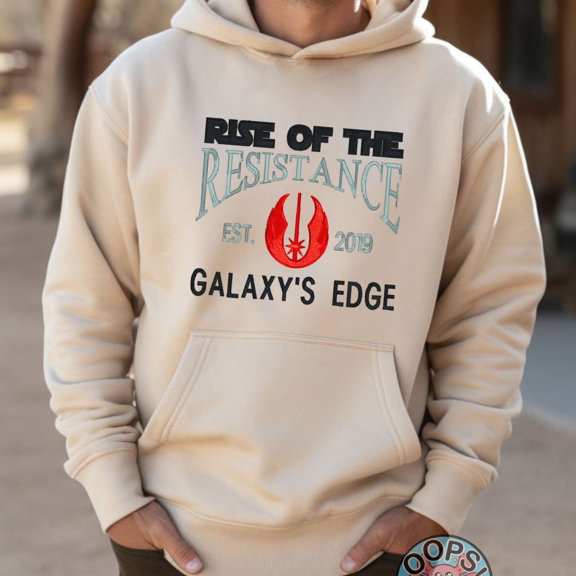 DISNEY GALAXY’S EDGE STAR WARS  RISE OF THE RESISTANCE SHIRT. Embroidered Heavyweight Unisex Hoodie in SAND.  Shop online today to get yours at HTTPS://OOPSBYKELLYNICOLE.COM 