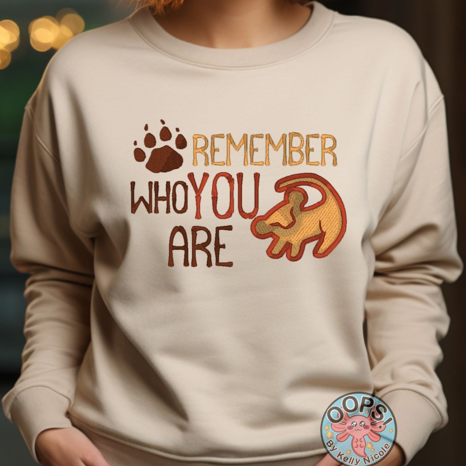 “Disney Lion King “REMEMBER WHO YOU ARE” ”Inspirational Embroidered Heavyweight Unisex Sweatshirt in SAND.  Shop online today to get yours at HTTPS://OOPSBYKELLYNICOLE.COM 