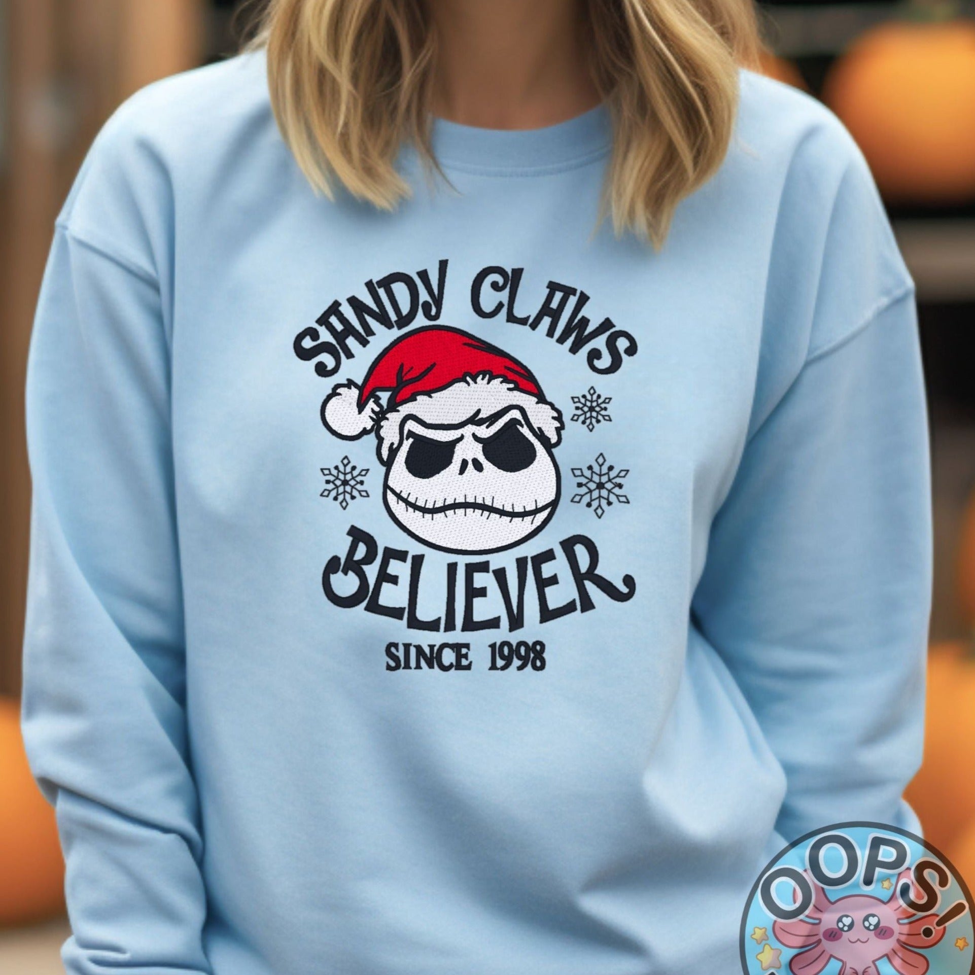 Jack Skellington, Nightmare Before Christmas, "Sandy Claus Believer"  Embroidered Heavyweight Unisex Sweatshirt in BLUE  Shop online today to get yours at HTTPS://OOPSBYKELLYNICOLE.COM 