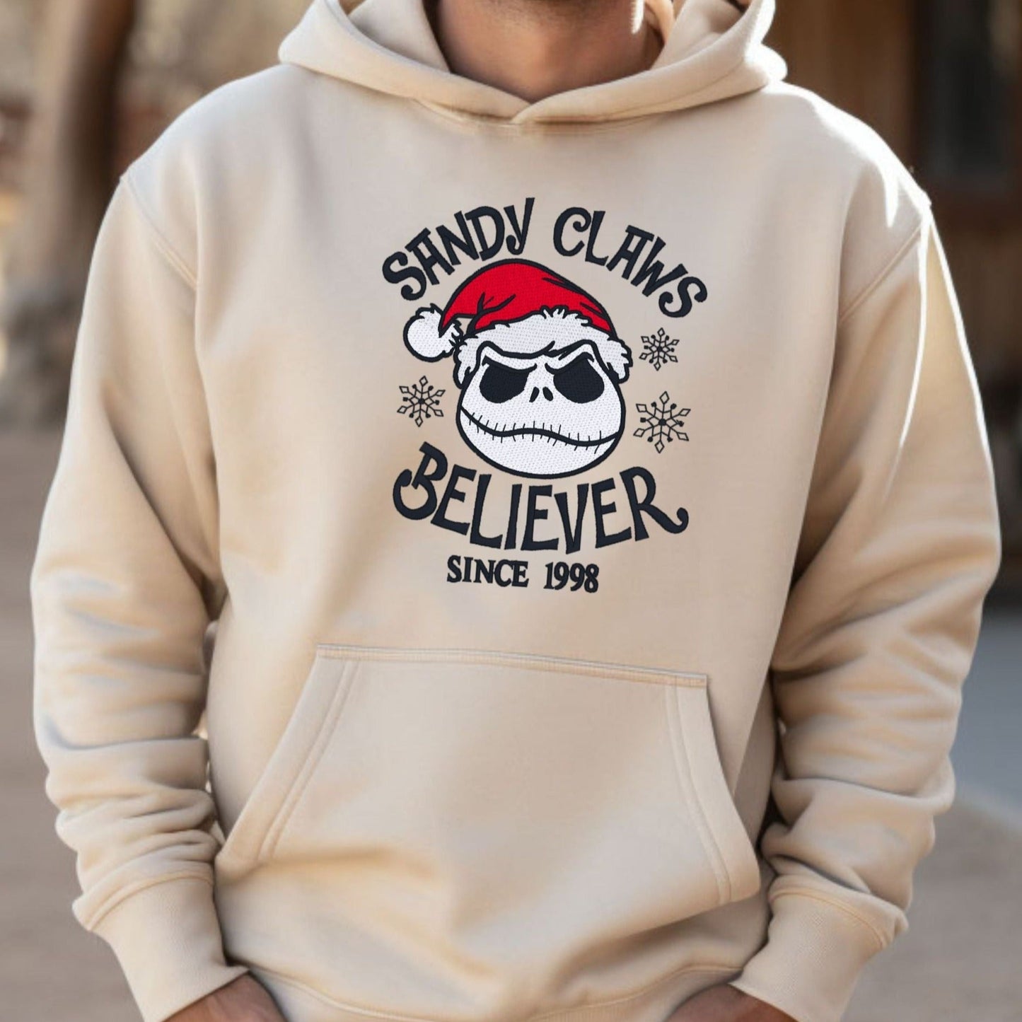 Jack Skellington, Nightmare Before Christmas, "Sandy Claus Believer"  Embroidered Heavyweight Unisex Hoodie in SAND.  Shop online today to get yours at HTTPS://OOPSBYKELLYNICOLE.COM 