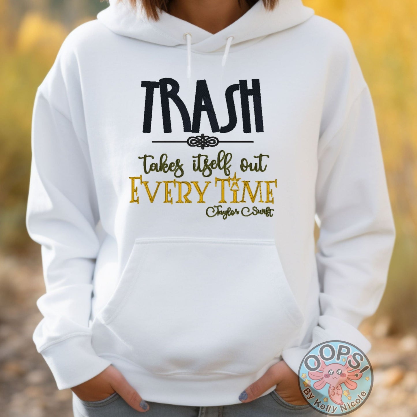 Taylor Swift “TRASH TAKES ITSELF OUT EVERY TIME“ Embroidered Fandom Embroidered Heavyweight Unisex Hoodie in White.  Shop online today to get yours at HTTPS://OOPSBYKELLYNICOLE.COM 