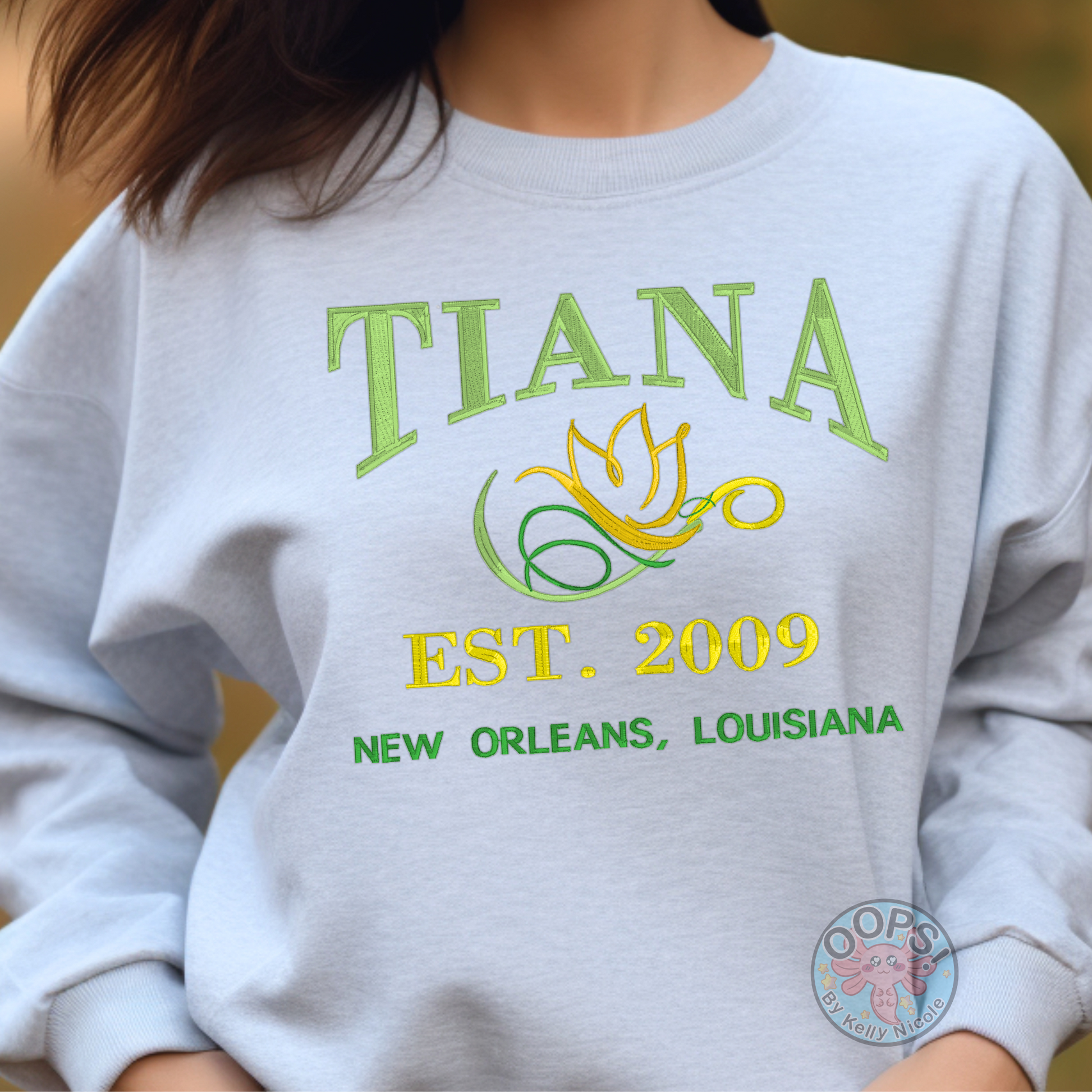 TIANA Disney Princess Embroidered  Heavyweight Unisex Sweatshirt in ASH.  Shop online today to get yours at HTTPS://OOPSBYKELLYNICOLE.COM 