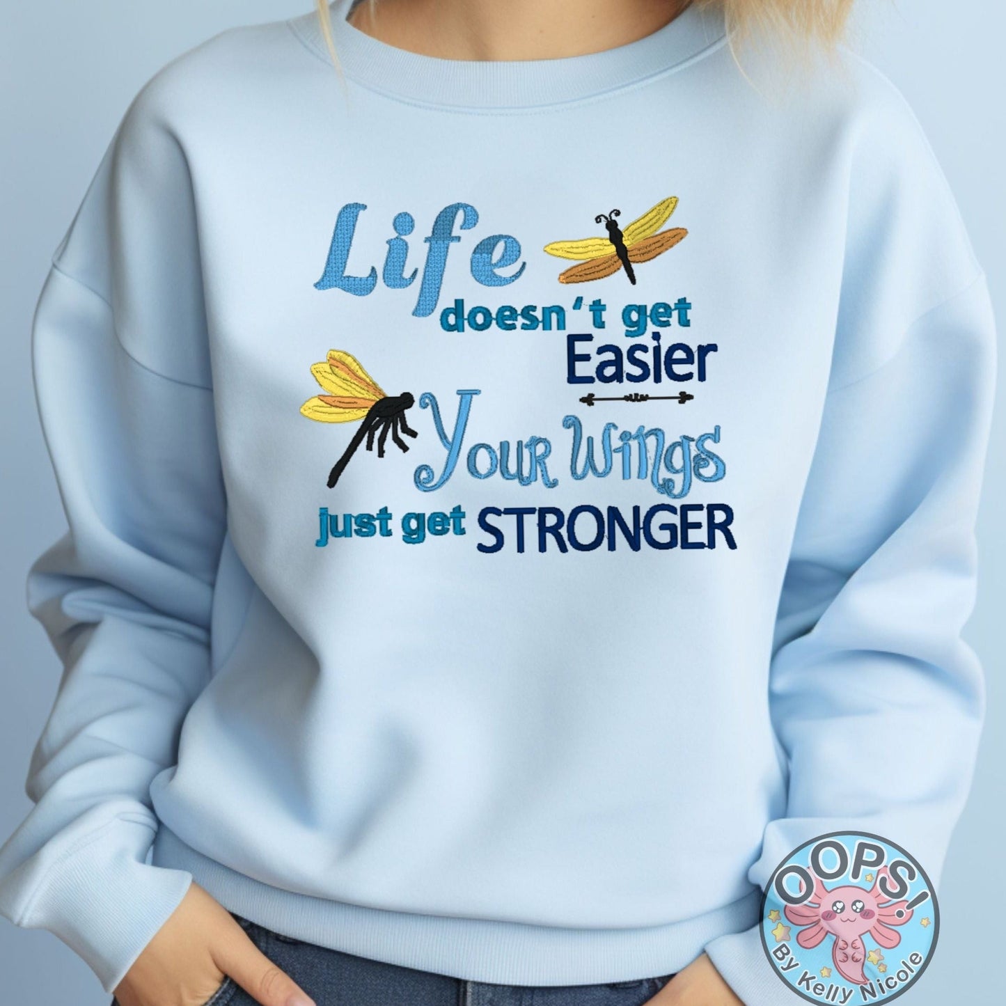  "LIFE DOESN'T GET EASIER, YOUR WINGS GET STRONGER". Inspirational Embroidered Heavyweight Unisex Sweatshirt in BLUE.  Shop online today to get yours at HTTPS://OOPSBYKELLYNICOLE.COM 