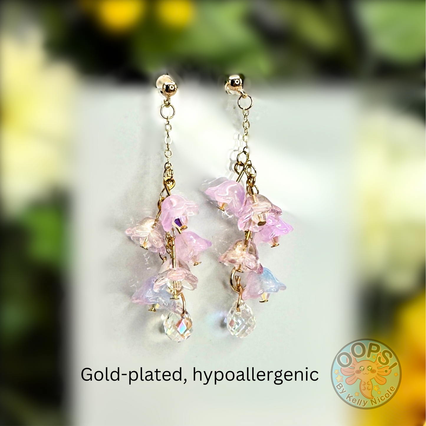 Wisteria Blush  Pink  Floral Drop Earrings with Crystal dangle. Gold-Plated.  Lightweight, Hypoallergenic Statement posts. Its  seamlessly transitions from casual outings, Weddings and elegant events. 003 Shop online today to get yours at HTTPS://OOPSBYKELLYNICOLE.COM