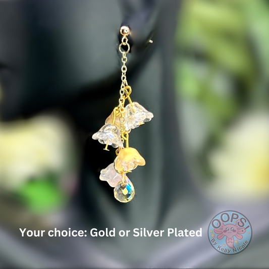 Wisteria Gold Blush  Floral Drop Earrings with Crystal dangle. Gold or Silver- Plated.  Lightweight, Hypoallergenic Statement posts. Its  seamlessly transitions from casual outings, Weddings and elegant events.  Shop online today to get yours at HTTPS://OOPSBYKELLYNICOLE.COM 