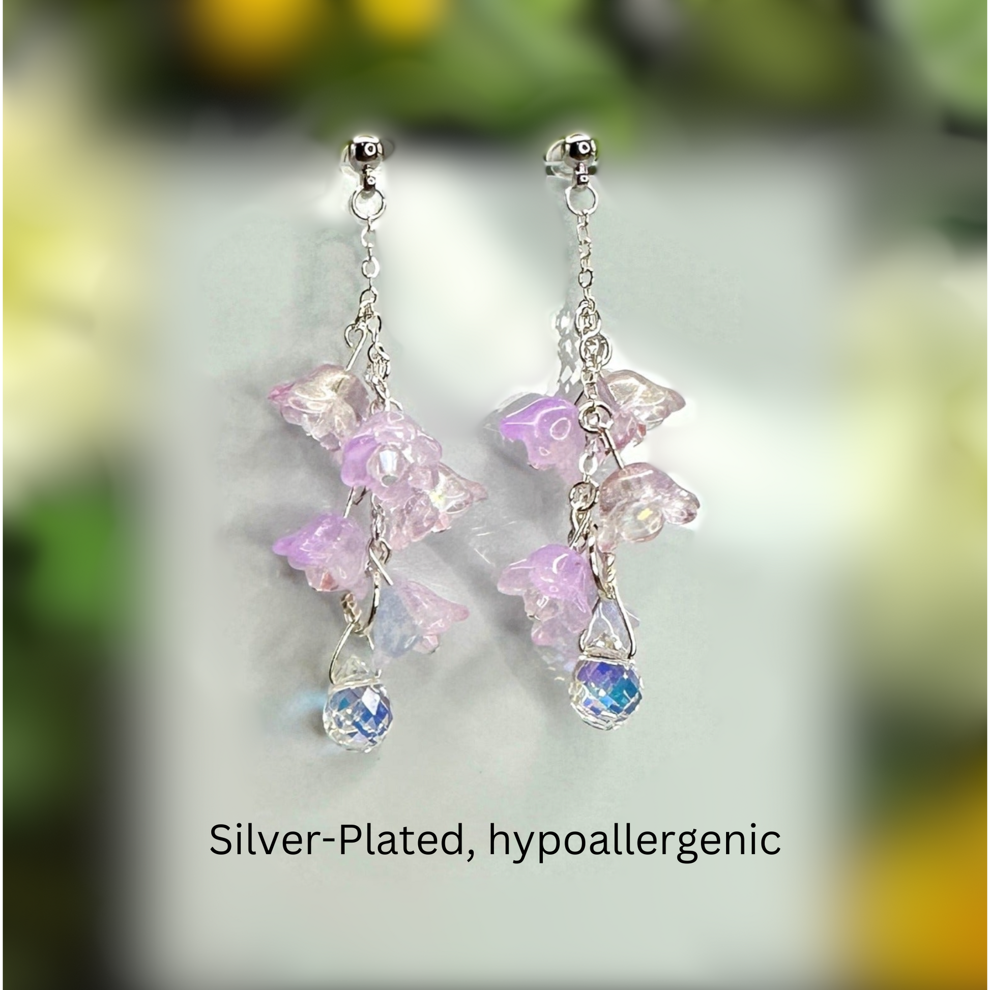 Wisteria Blush  Pink  Floral Drop Earrings with Crystal dangle. Silver-Plated.  Lightweight, Hypoallergenic Statement posts. Its  seamlessly transitions from casual outings, Weddings and elegant events. 003 Shop online today to get yours at HTTPS://OOPSBYKELLYNICOLE.COM